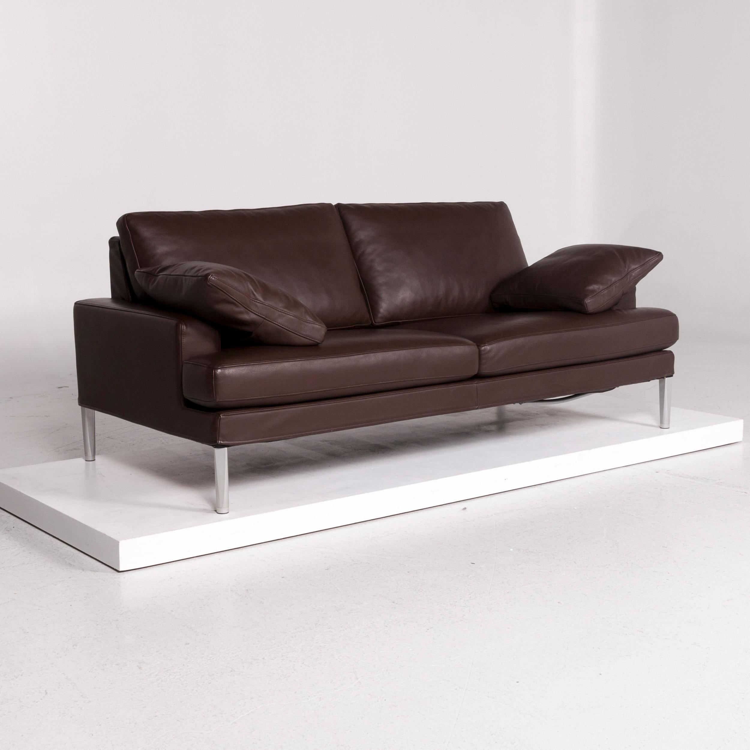 We bring to you a FSM Clarus leather sofa set brown dark brown 1 three-seat 1 two-seat.


 Product measurements in centimeters:
 

 Depth 86
Width 189
Height 81
Seat-height 44
Rest-height 54
Seat-depth 51
Seat-width 128
Back-height
