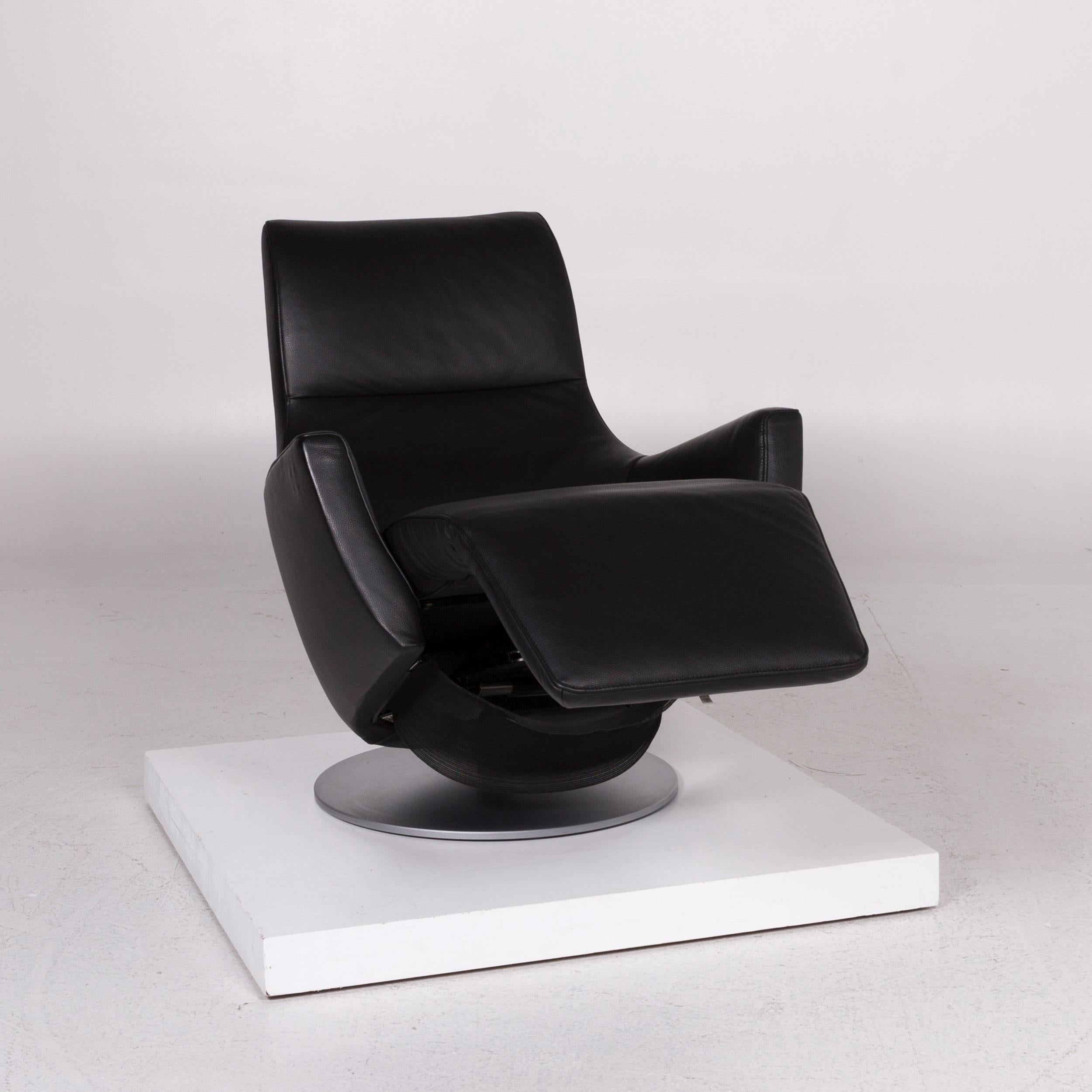 We bring to you a FSM leather armchair black incl. function.
 

 Product measurements in centimeters:
 

Depth 94
Width 76
Height 106
Seat-height 49
Rest-height 60
Seat-depth 51
Seat-width 58
Back-height 64.

 