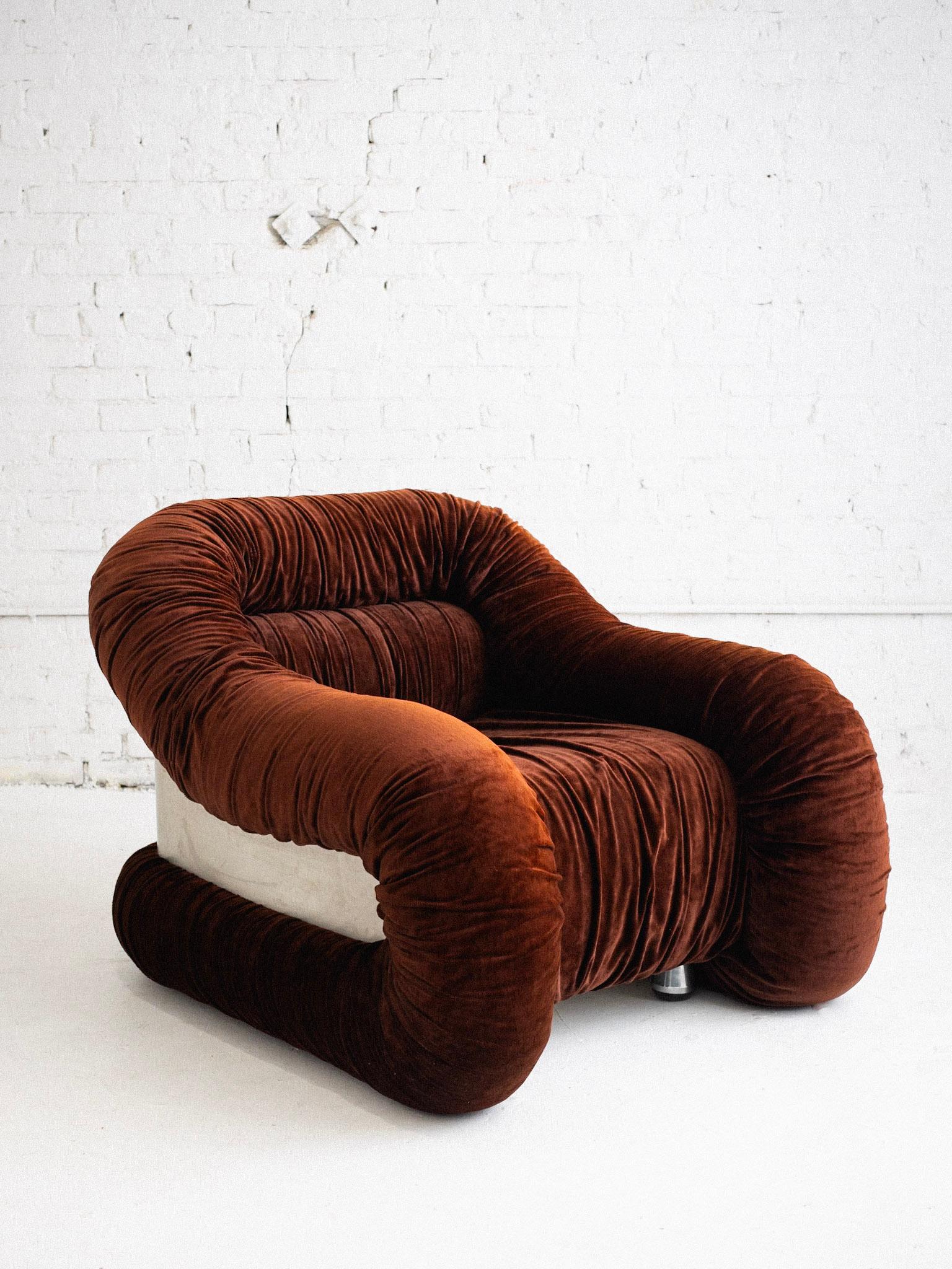 A mid century Italian lounge chair by F&T Salotti. Overstuffed space age silhouette. Original chocolate brown ruched velvet and brushed steel panel. Two chairs and one sofa available, all sold separately. Sourced in Florence Italy.

F&T Salotti is
