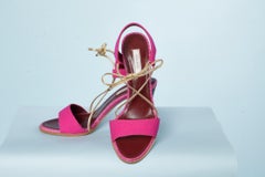 Fuchsia crepe fabric and gold leather shoelace Nina Ricci