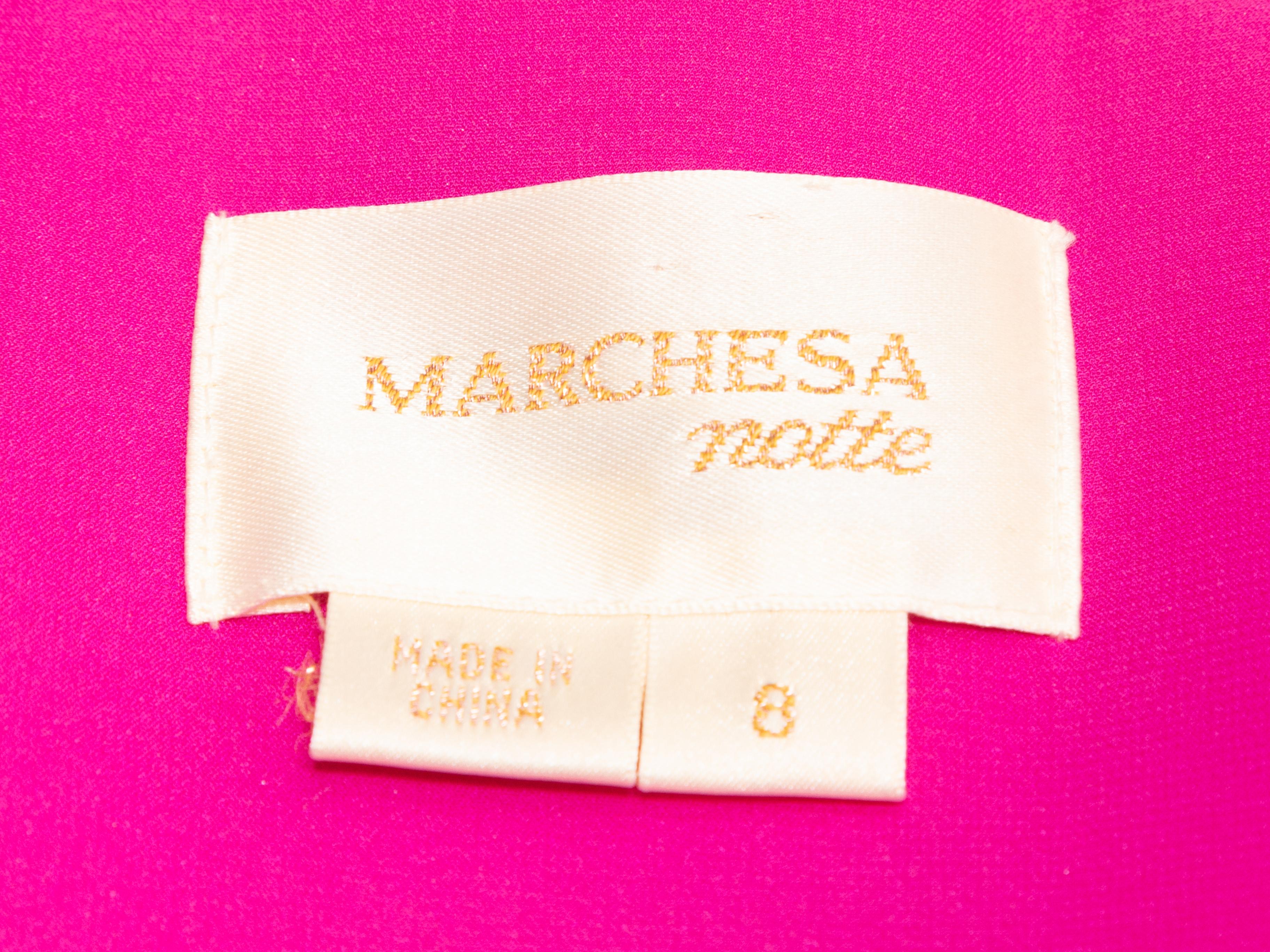 Fuchsia silk strapless ruched mini dress by Marchesa Notte. Ruffel trim at bust. Zip closure at center back. 28