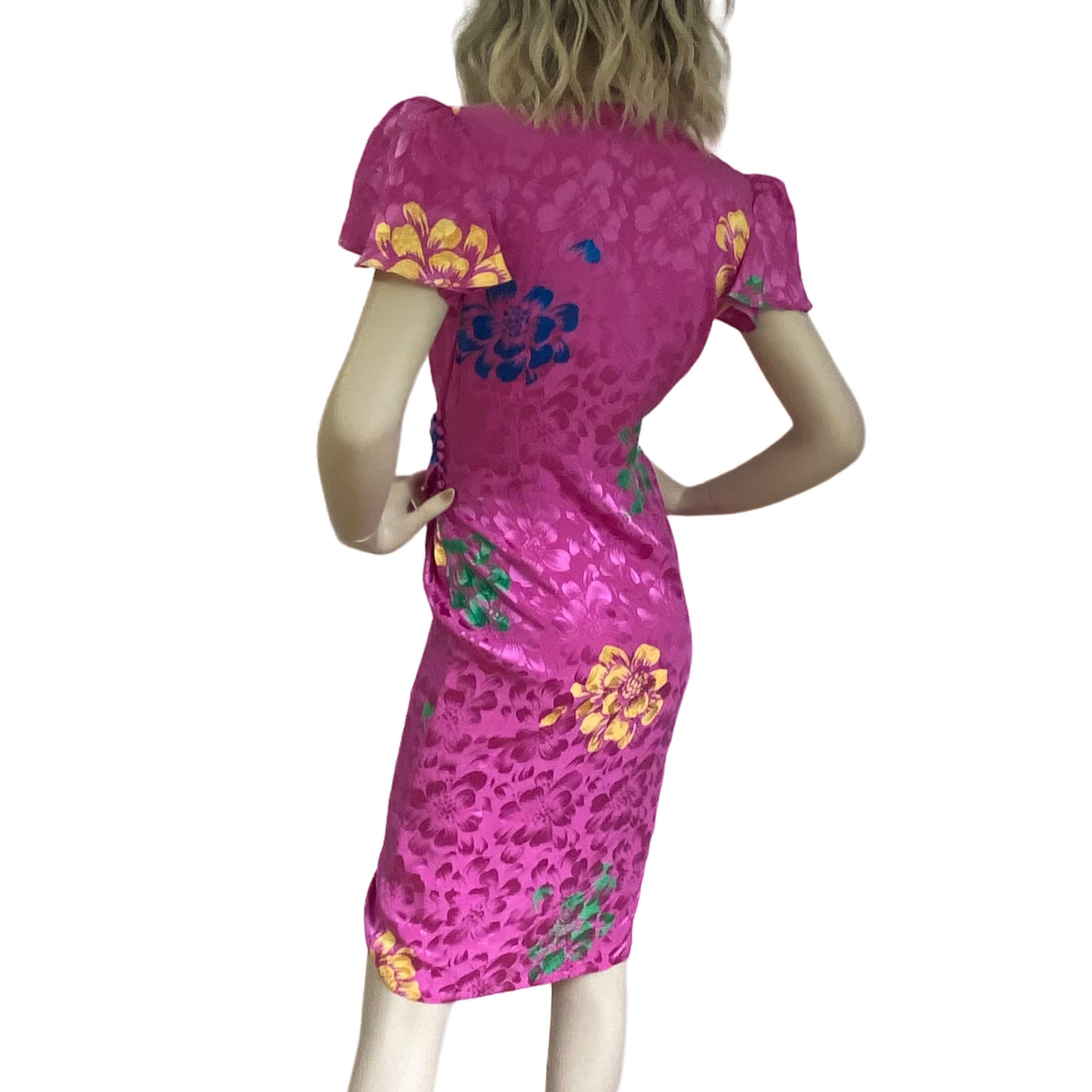 Flora Kung flutter sleeve silk jacquard wrap 'Gwyn' dress. 
Flutter sleeves and sleeve pads.
Spaghetti ties plus self-fabric covered loops and buttons.
Dress only. Accessories are listed separately.
Condition: NWT from FK design library 
Check out