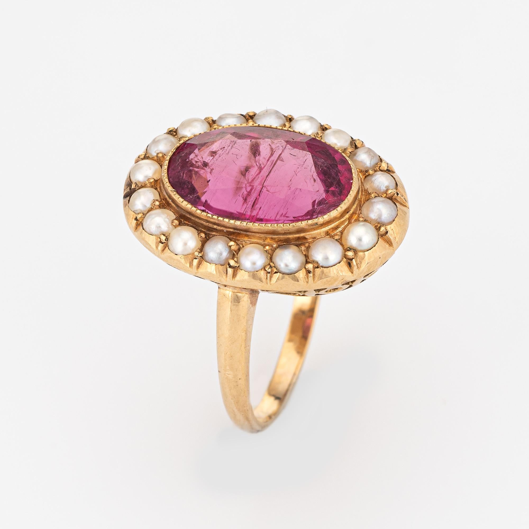 Stylish vintage pink tourmaline & pearl cocktail ring (circa 1950s to 1960s) crafted in 14 karat yellow gold. 

Faceted oval cut pink tourmaline measures 12mm x 9mm (estimated at 4.50 carats), accented with 18 x 2mm cultured pearls. The pink