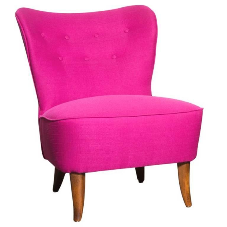 Girly pop of pink in this armless Theo Ruth lounge chair for artifort. Newly re-upholstered. Wood in original condition.