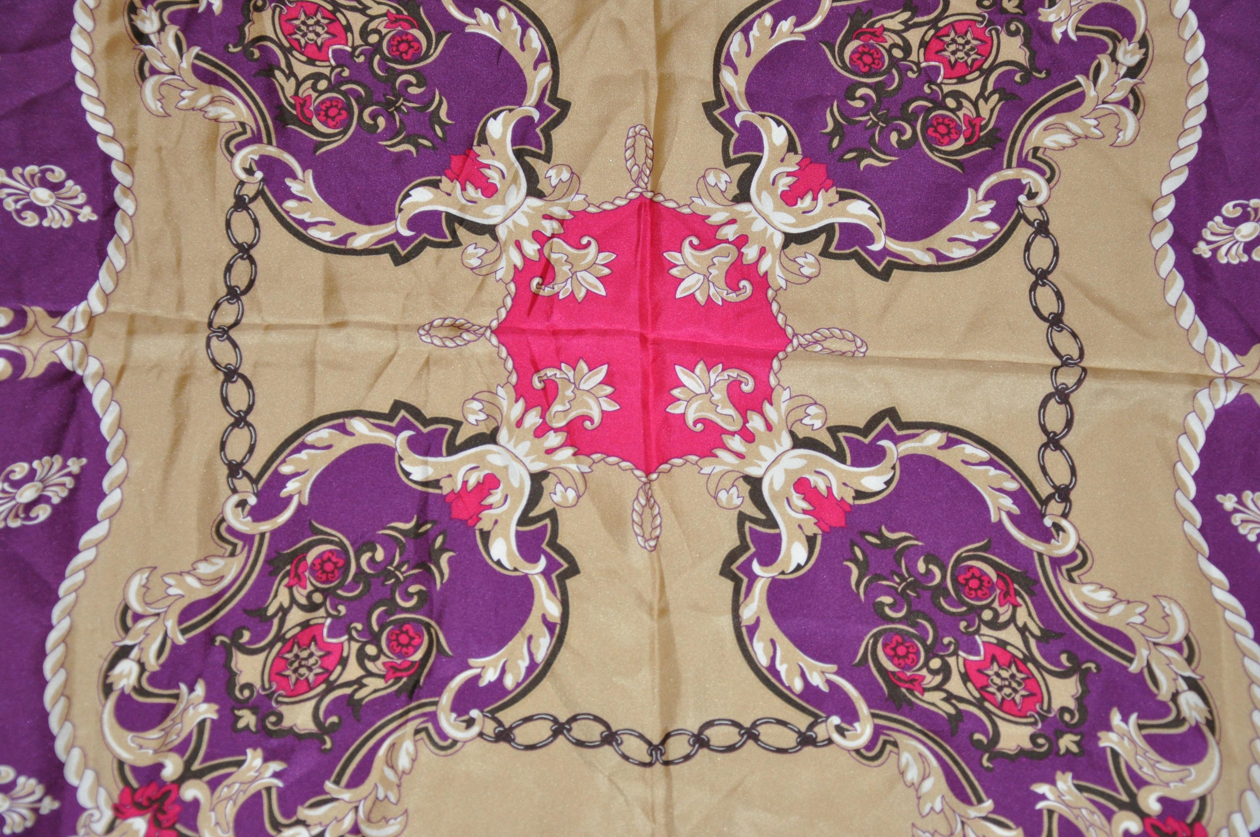        Fuchsia & Violet Majestic silk scarf finished with hand-rolled edges, measures 35 inches by 35 inches. Made in Italy.
