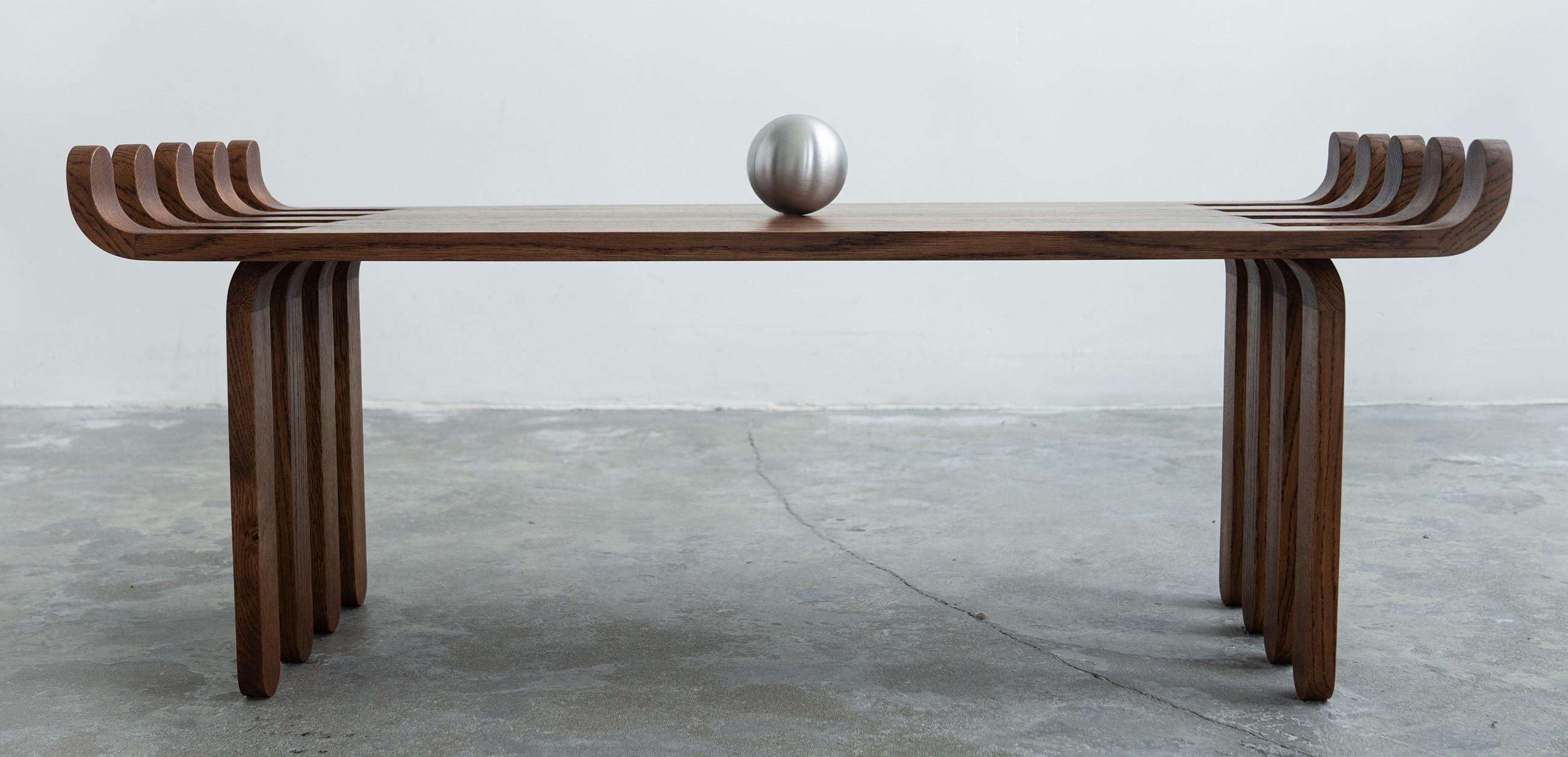 Fuga Coffee Table by Katryna Sadauskaite
Dimensions: W 36 x L 100  x H 41 cm
Materials: Oak Wood, Stainless steel, Wooden parts have hard wax oil finish.

A designer from Lithuania, searching for a balance between function and minimal aesthetics.