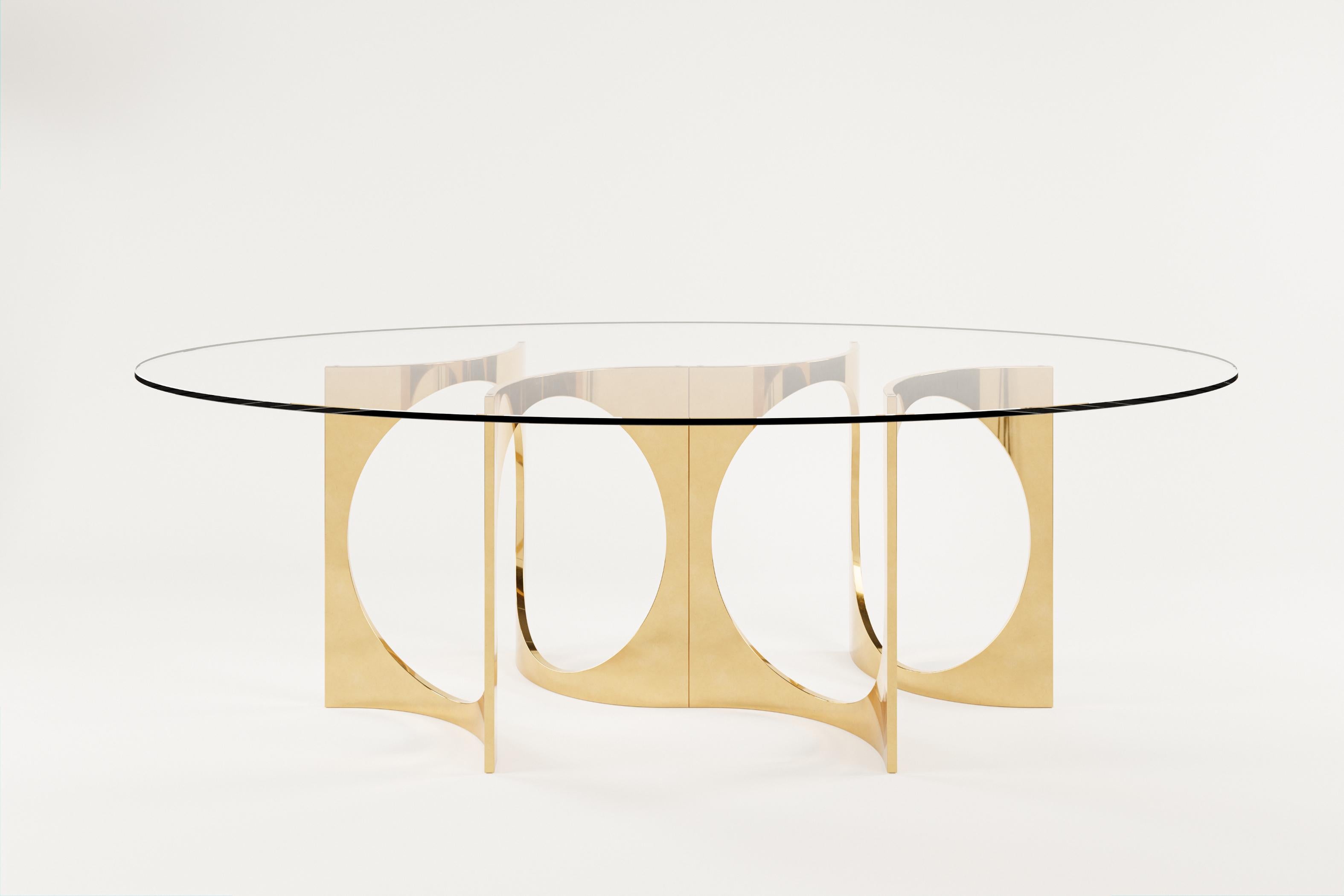 Table de salle à manger Ellipse Fuga Duo en bronze moulé et verre par Metamorphic Art Studio
Dimensions : L 240 x D 140 x H 76 cm
MATERIAL : Bronze coulé, verre

La table Fuga est une table sculpturale à l'élégance intemporelle. La base est
