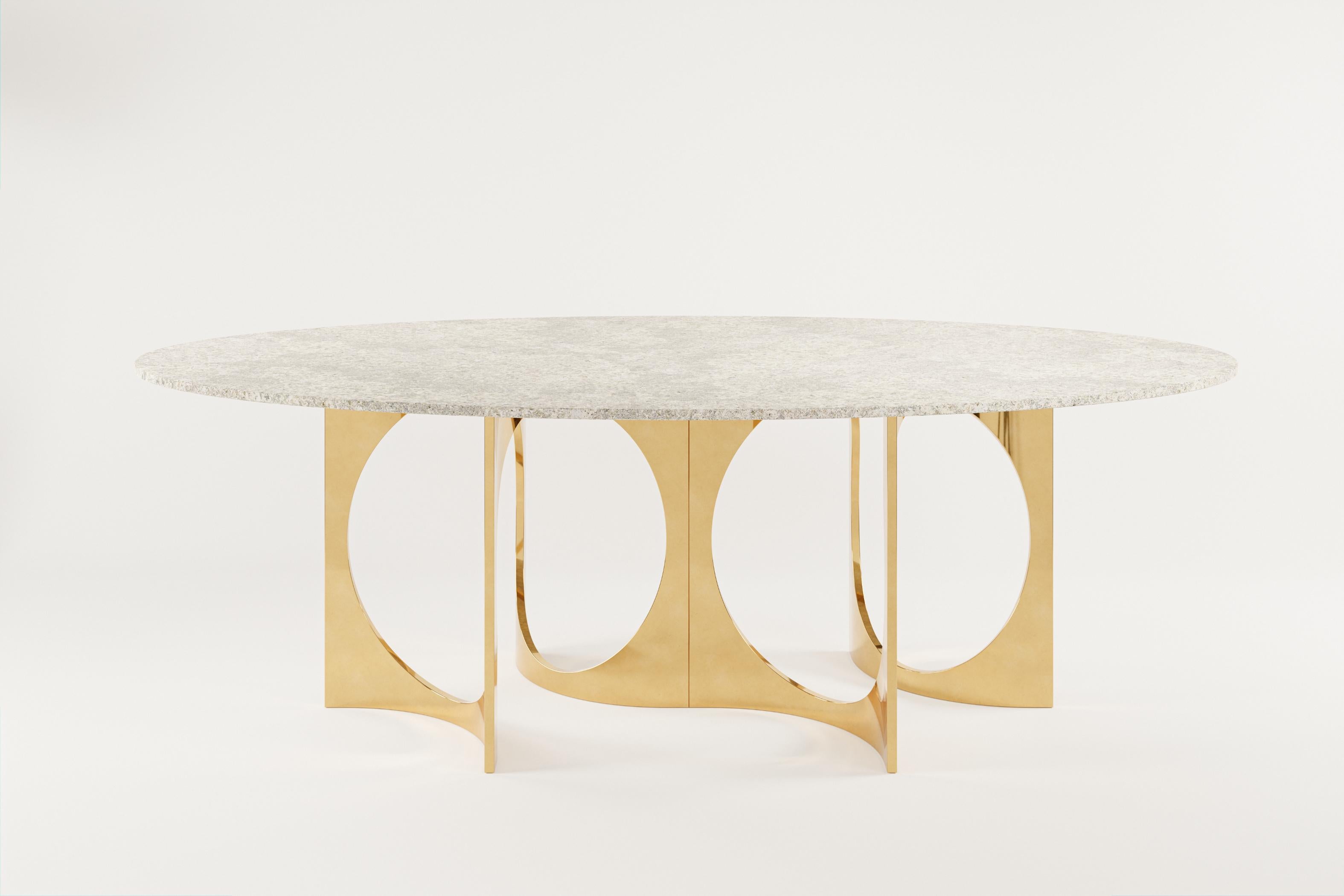 Ellipse Fuga Duo Dining Table in Cast Bronze and Stone by Metamorphic Art Studio
Dimensions: W 240 x D 140 x H 78 cm
Materials: Cast Bronze, Stone

The Fuga table is a sculptural table with timeless elegance. The base is handcrafted in Belgium from