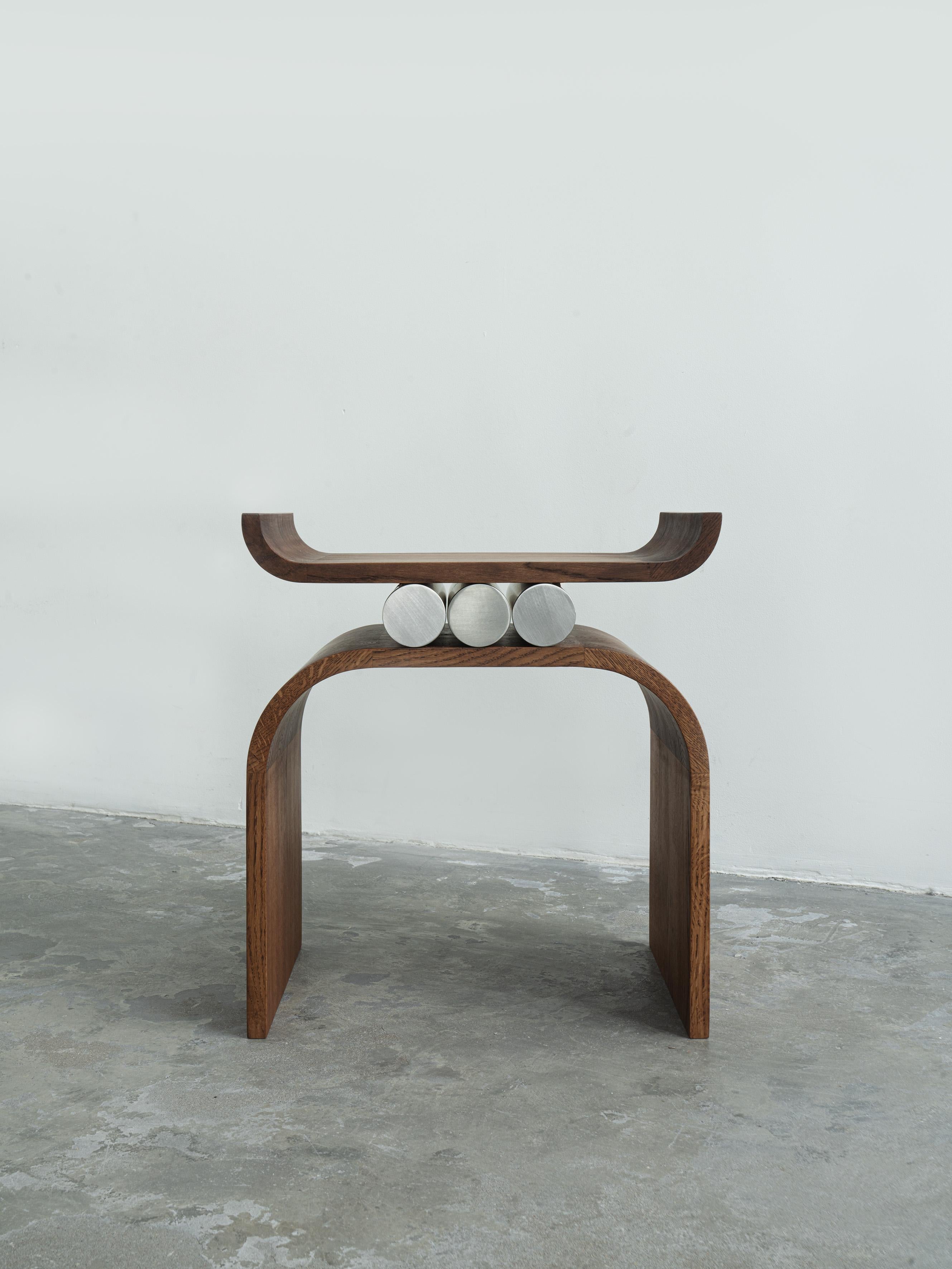 Fuga Stool by Katryna Sadauskaite
Dimensions: W 30 x L 44 x H 45 cm
Materials: Oak Wood, Stainless steel, Wooden parts have hard wax oil finish.

A designer from Lithuania, searching for a balance between function and minimal aesthetics. She
