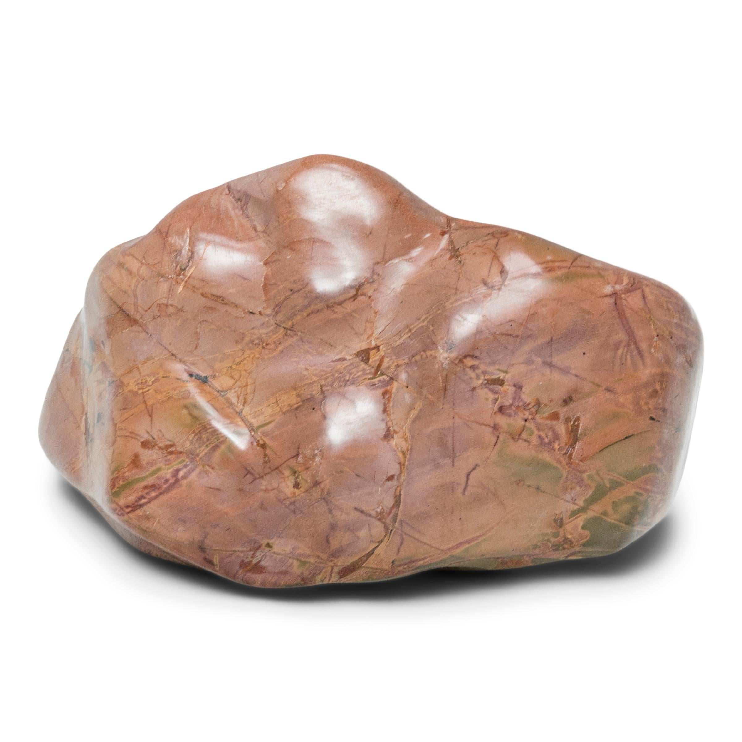 A well-chosen stone is a focal point of both a traditional Chinese garden and a scholar's studio - evoking the complexities of nature and inspiring creative thought. This meditation stone has a subtle pattern of thin green-and-red strata, the result