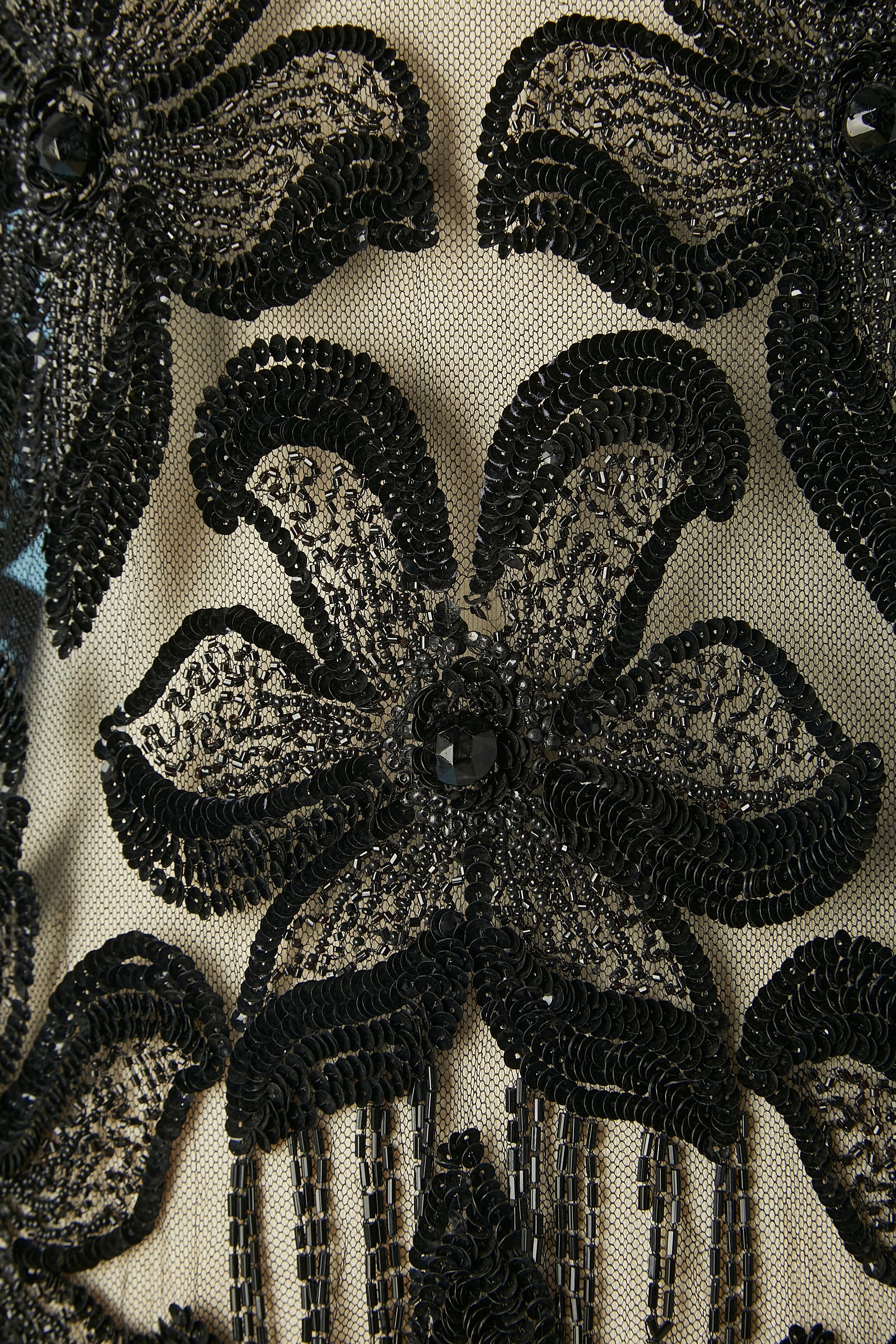 Full beaded ( beads and sequins) on tulle black evening dress. See-through
Size 38/ M 