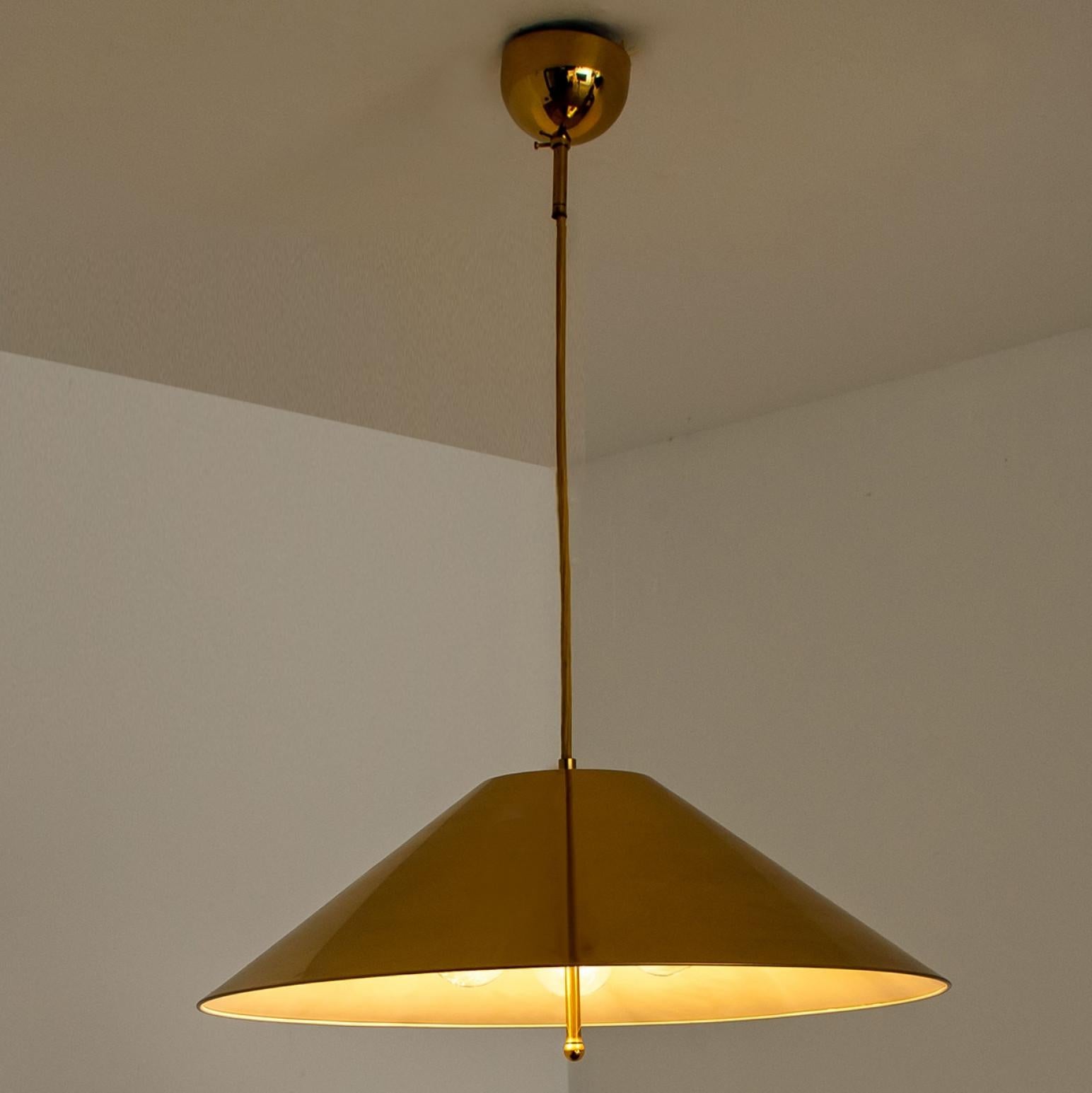 German Full Brass Pendant Light with Tapering Lampshade by Florian Schulz, 1970 For Sale