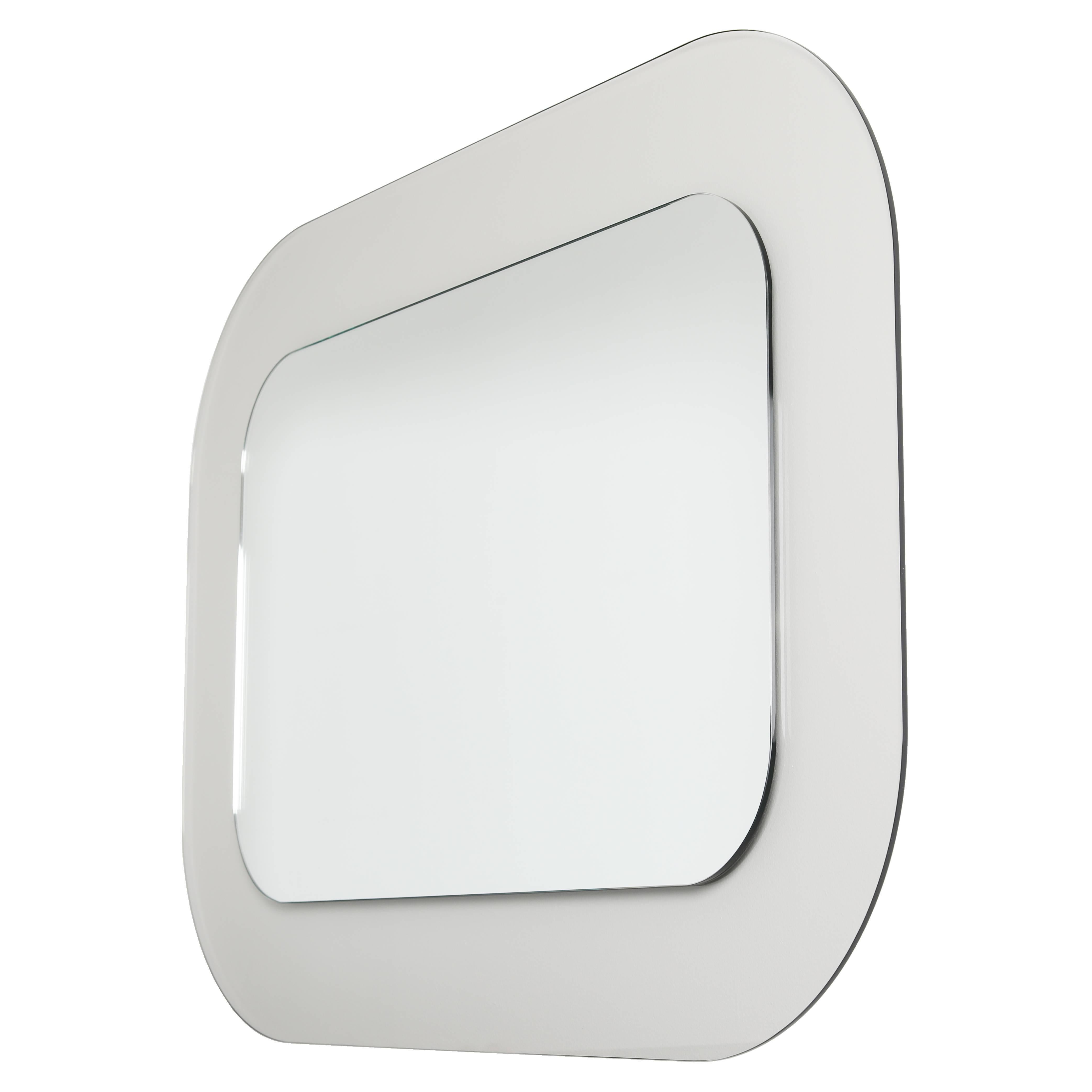This piece is part of a new line of full circle modern original fully customizable, acrylic-frame mirrors. The translucent frame is reminiscent of the 1950s curvaceous glass designs by legendary Italian maker Fontana Arte, but with a shape and