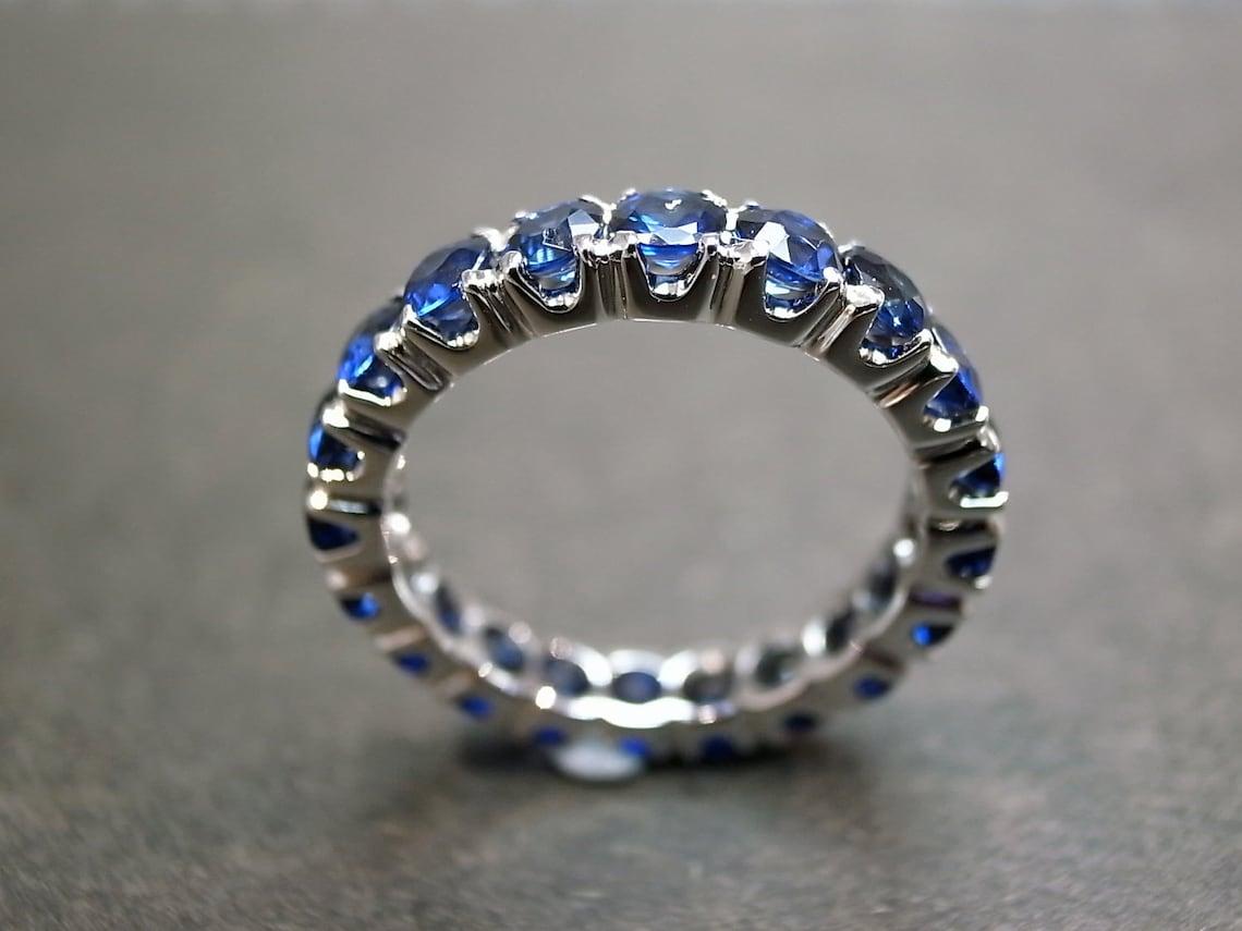 For Sale:  Full Eternity Blue Sapphire Wedding Ring Band in 18K White Gold 6