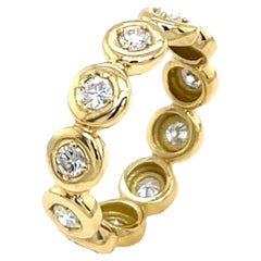 Anello di diamanti a eternità completa, con diamanti naturali da 0,65 ct. in oro giallo 18 ct.