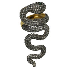 Anello a serpente in argento ossidato con pave di diamanti naturali a tutto il dito