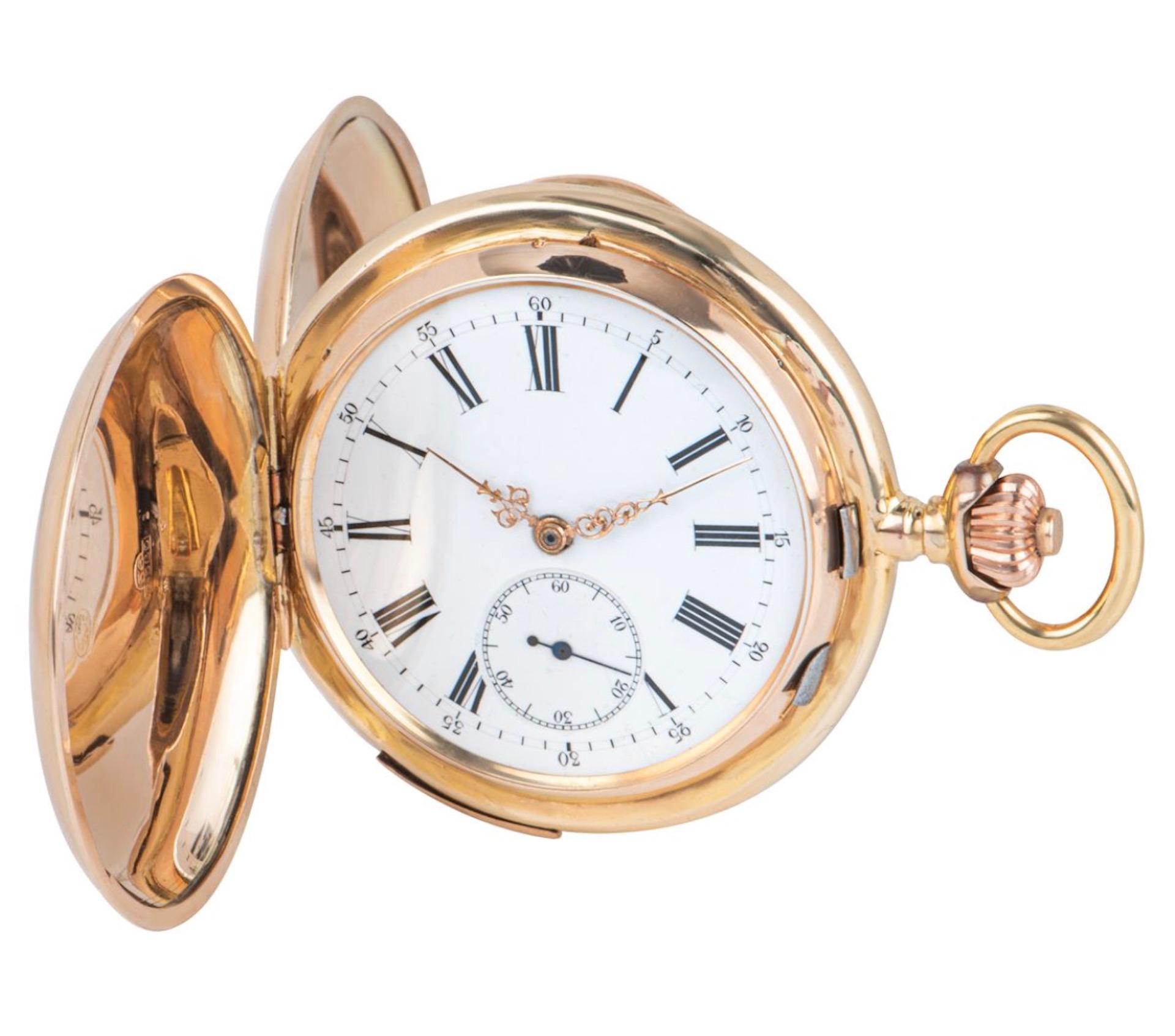 A 14ct Rose Gold Erotic Automaton Swiss Full Hunter Quarter Repeater Keyless Lever Pocket Watch C1900s.

Dial: A white enamel dial with Roman Numerals outer minute track with Arabic minute markers at five minute intervals, a sub second dial at six
