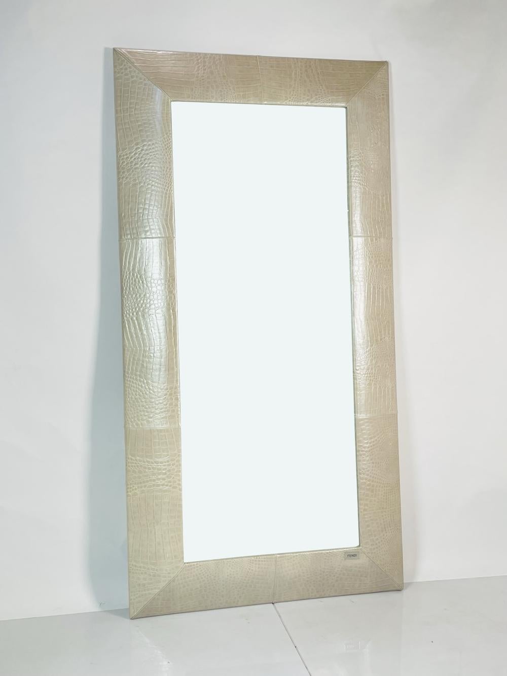 Creae and silver embossed leather Fendi Casa Alupel floor mirror with tonal stitching throughout, mirrored glass surface, rectangular form and brand plaque at base.
Measurements:
85 inches high x 43.50 inches wide x 4 inches deep.
 