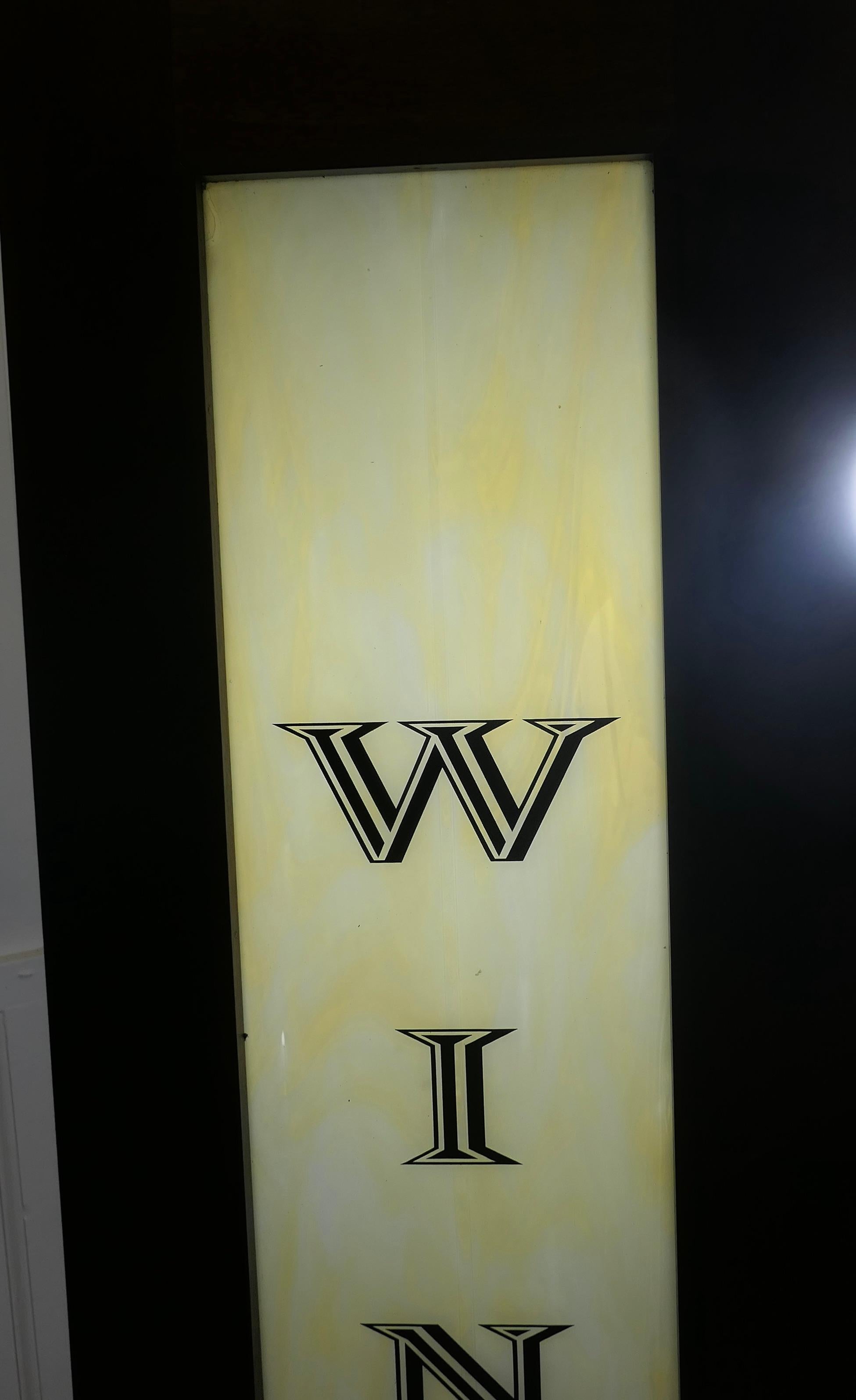 Full Length Opaline Glass Bar Sign, Wines

Saved During Refurbishment, this very good quality piece is framed in solid Walnut, the  sign itself “WINES” is on very attractive Opaline glass which has waves in pale blue and cream 
We have more of these