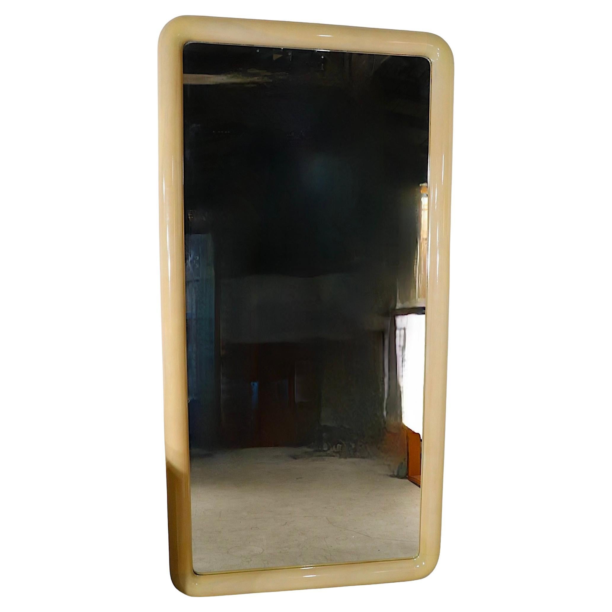 Fabulous oversized mirror by noted high end maker, Marcus & Jonson. The mirror features a lacquered parchment frame, and plate glass mirror. This spectacular mirror is in excellent, original condition, clean and ready to install. It is currently