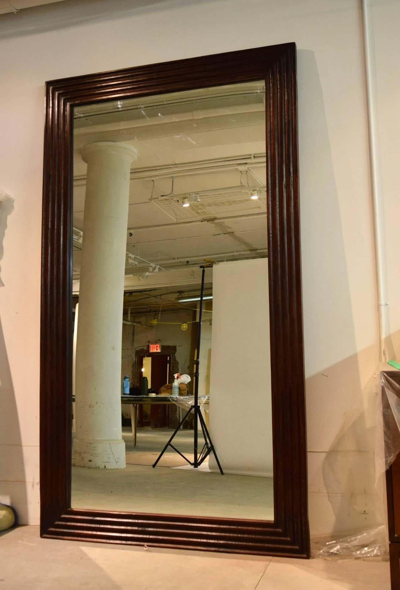 Large scale, full length mirror with hand fluted solid wood frames in very good, original condition and ready to hang horizontally or vertically. It can also be used as a floor mirror leaned against a wall as shown. Thicknesses/depths vary from 1.25