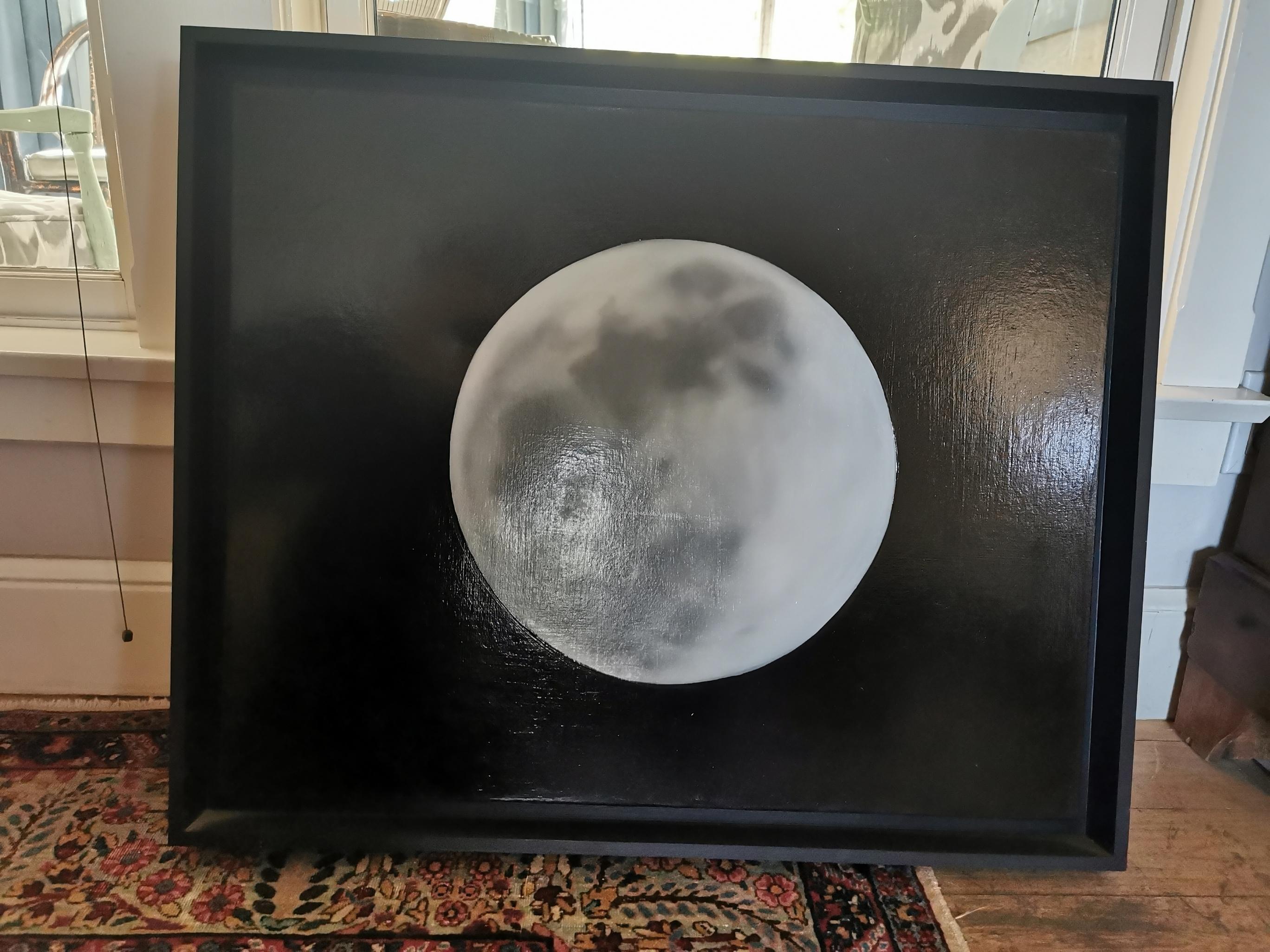 Oil painting of the moon, by late artiste David Cox, the painting is a powerful depiction of the moon and its mesmerizing details and shadows when full. The painting is realistic and very communicative. The frame was done by the artist himself.
