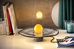 Yellow Glass Sphere on Swirling Marbled Smokey Grey Glass Base by Aina Kari