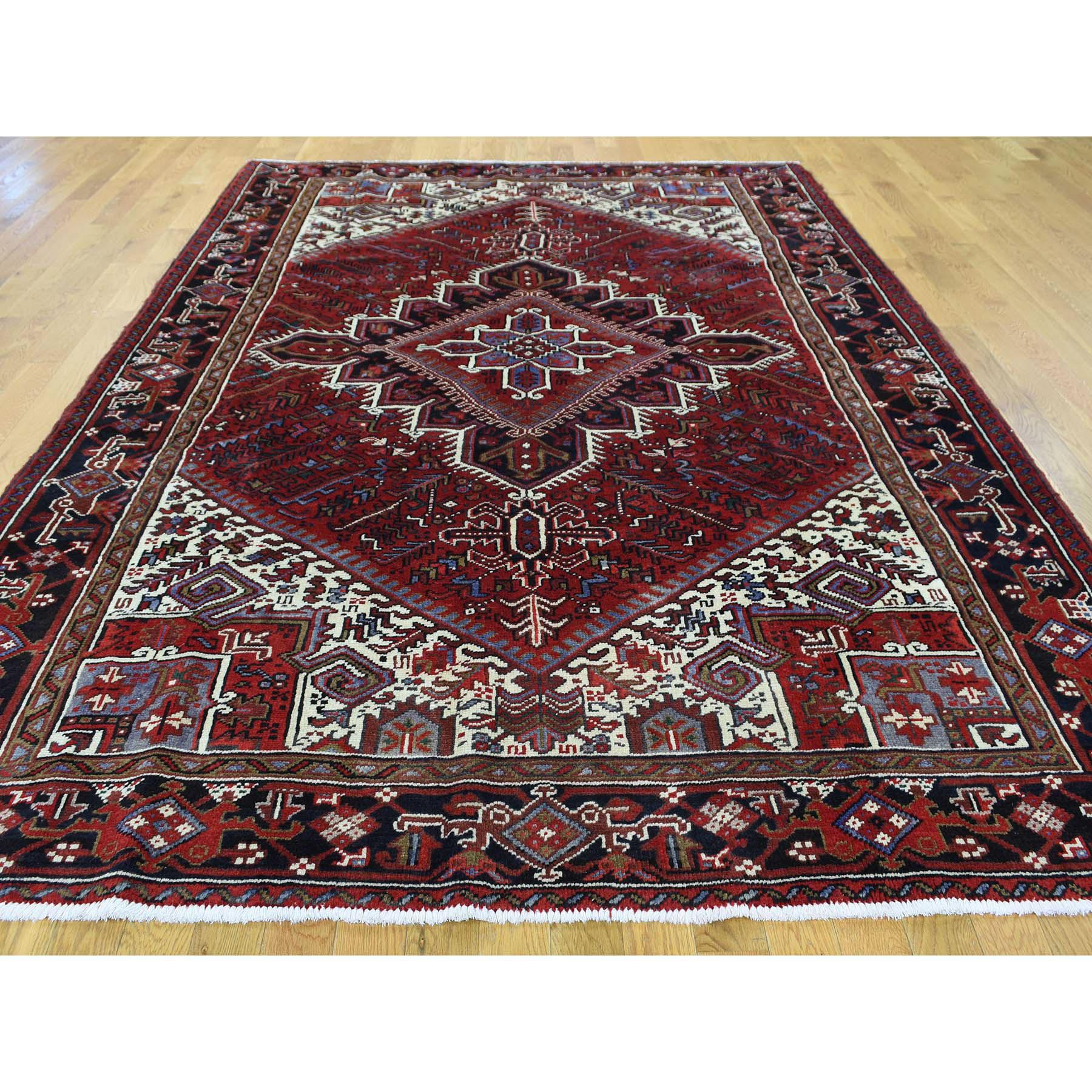 This is a truly genuine one-of-a-kind full pile semi antique Persian Heriz excellent condition rug. It was made in the centuries-old Persian weaving craftsmanship techniques by expert artisans. Measures: 6'7