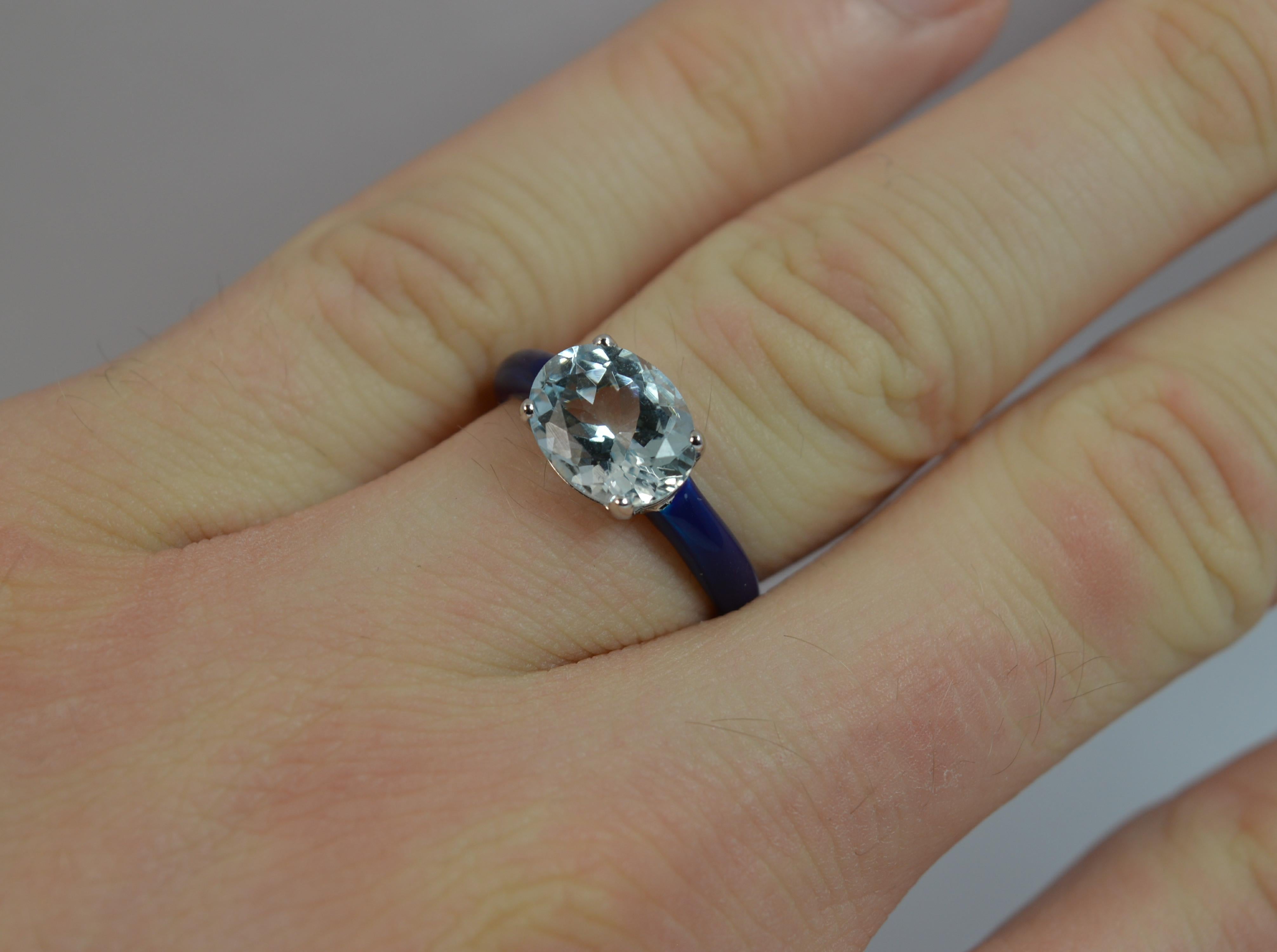 
A stunning Aquamarine and full enamel ring.

Modelled in 18 carat white gold.

Four claw setting for the 7.6mm x 9.8mm oval cut natural aquamarine.

Stuning Royal Blue enamel runs throughout the whole piece.


CONDITION ; Excellent. Clean and solid