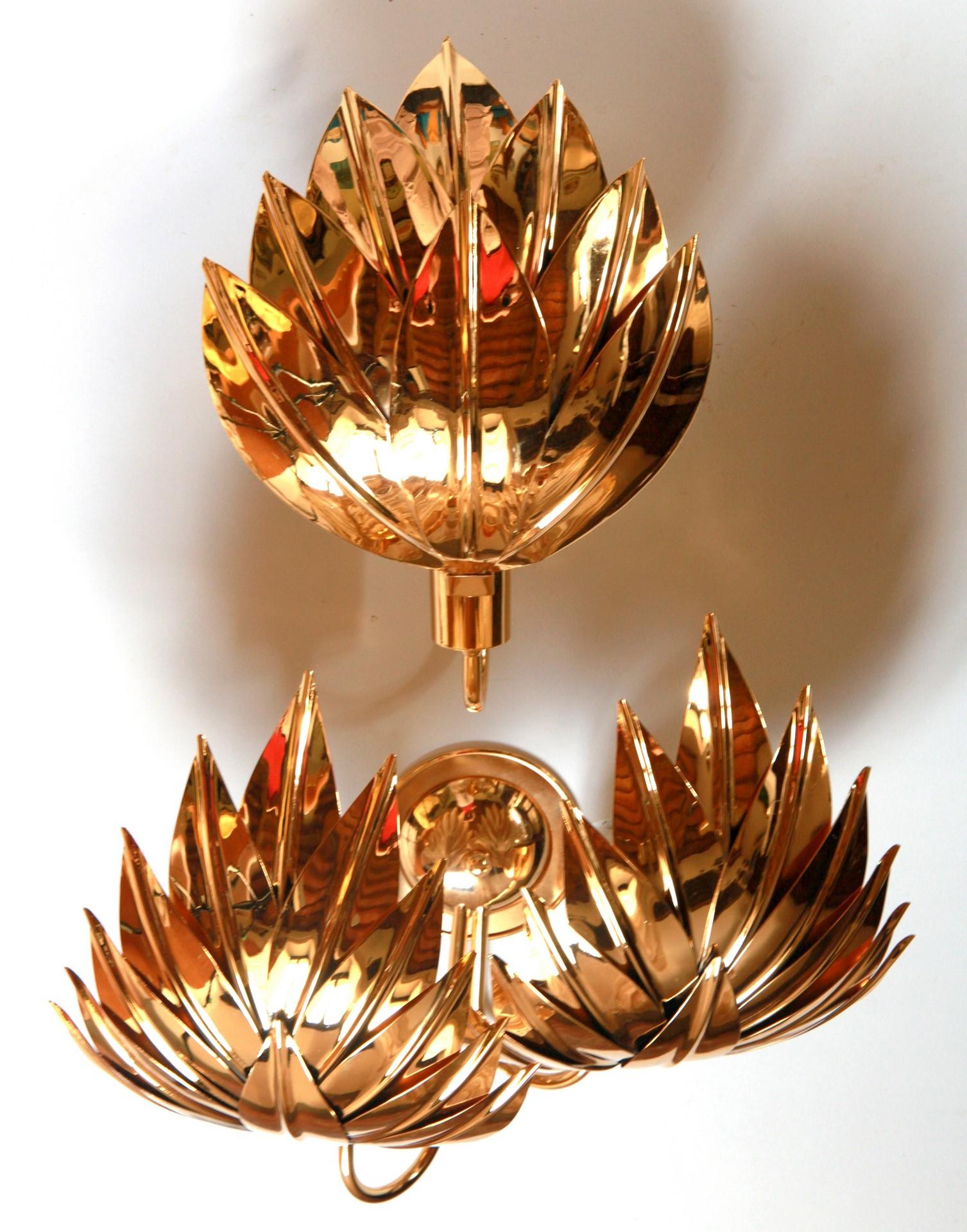 This listing is for the full set of 9 Sconces. 

The sconces were showing some age for regular use and gold discoloration. I have had them completely re-polished and gilded with thick gold plating and re-wired.

I am listing with Jansen (Maison