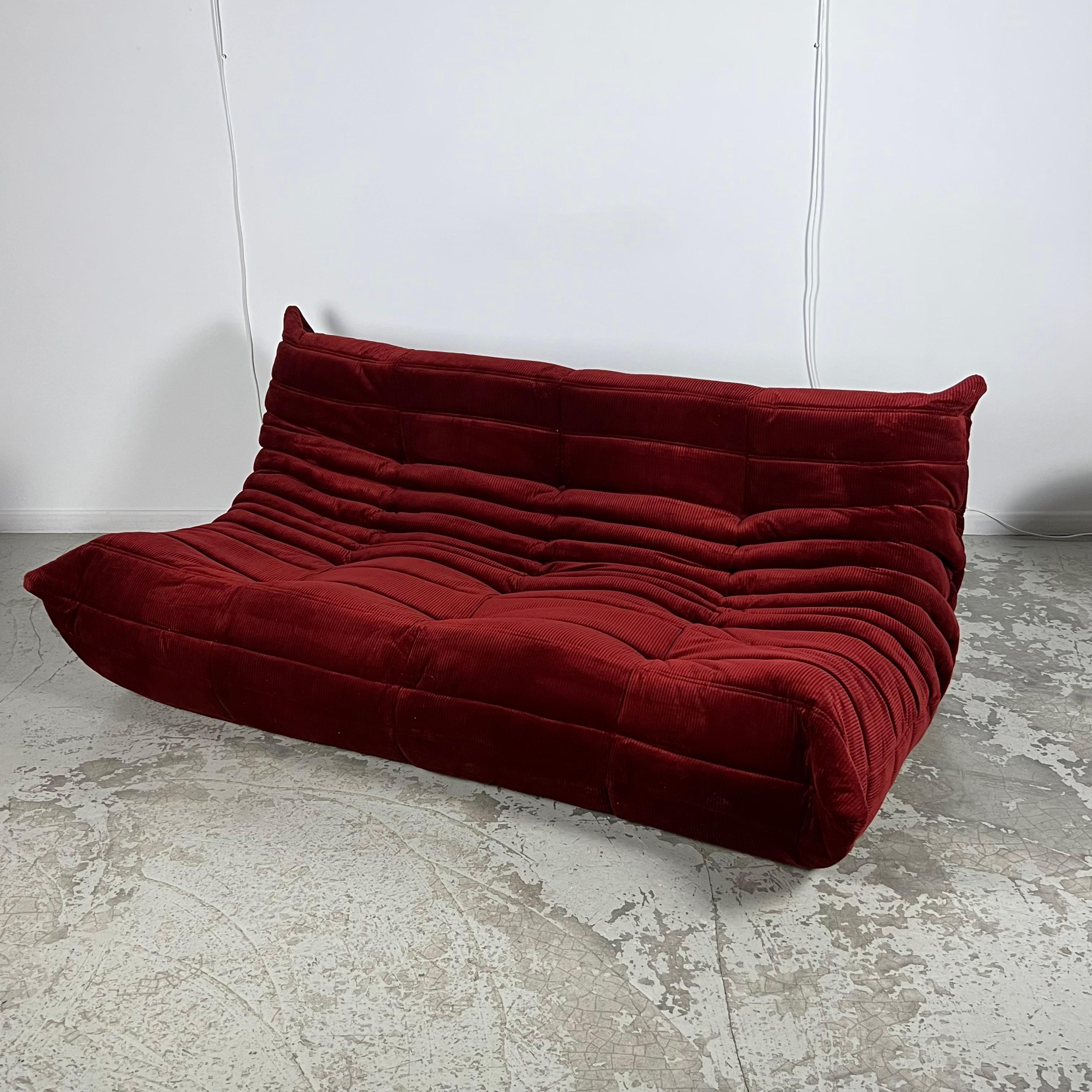This sofa was designed by Michel Ducaroy for Ligne Roset in the 70’s. He devoted 26 years of his life to the head of Ligne Roset’s design department. It was in 1973 that he designed his most iconic creation: the Togo sofa. 
According to him, this
