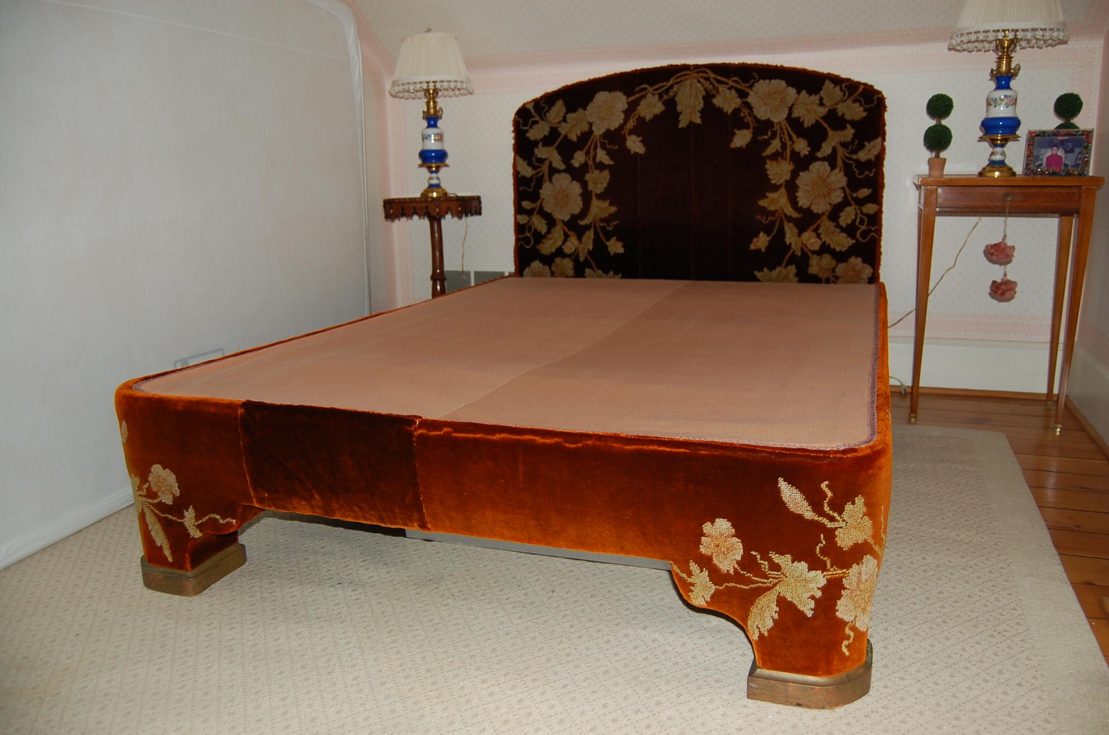 This bed was constructed in the late 1970s and covered in antique embroidered cut velvet Mohair panels (Portiere in Louis' grandmothers home) circa 1925, accepts a full size mattress as shown. The headboard mounts using screws, the platform base is