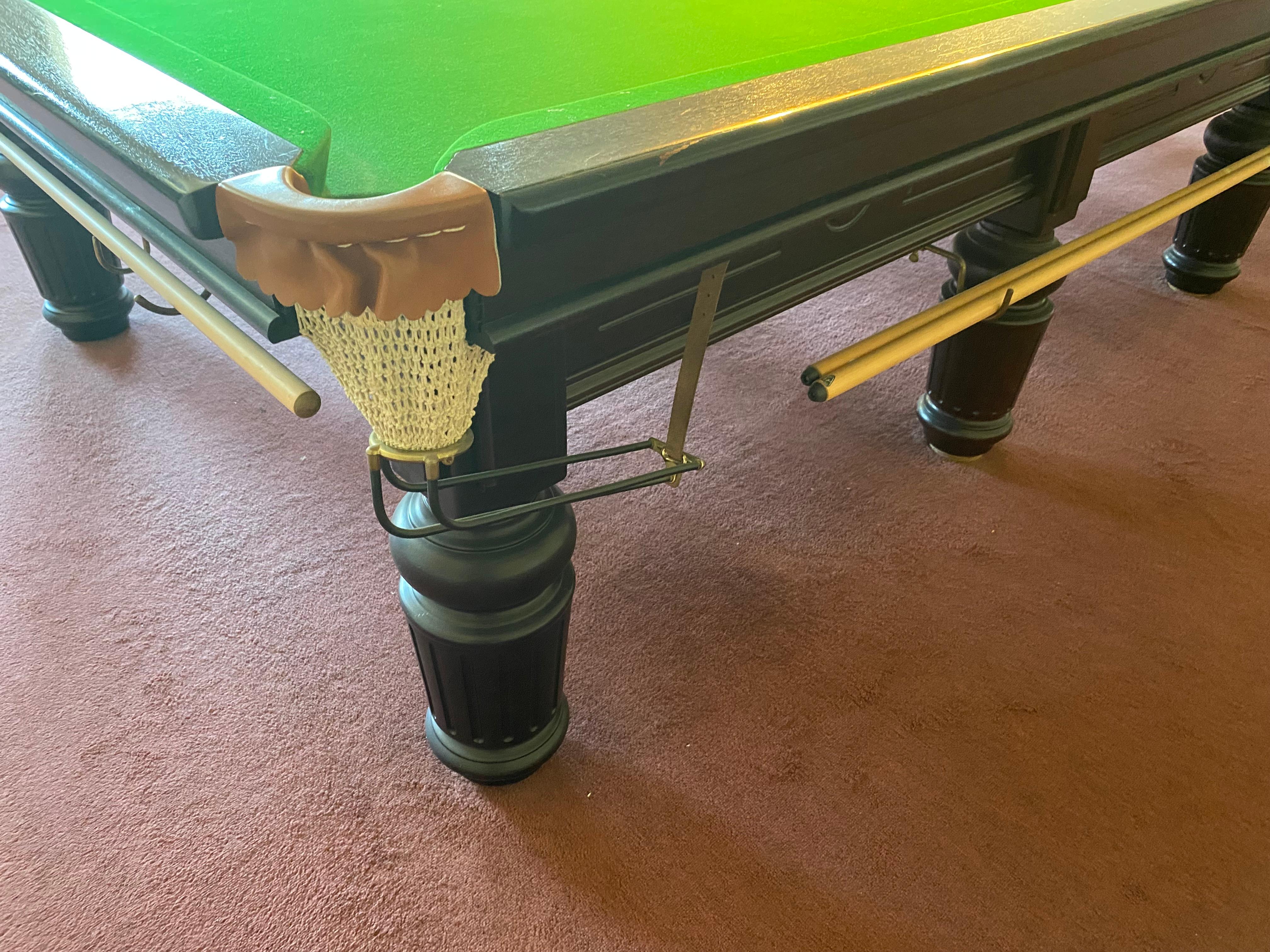 Own the ultimate gaming experience with this full-size snooker/billiards table originally supplied by  Hubble & Freeman  of Maidstone, England. Crafted with precision and care, this table is the perfect addition to any game room or entertainment