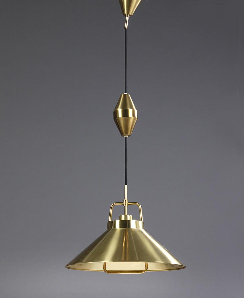- Solid brass pendant by Fritz Schlegel
- Manufactured by Lyfa in Denmark in the mid-1960s
- Brass mounting bracket with adjustable height and original matching brass canopy
- Model P 295.