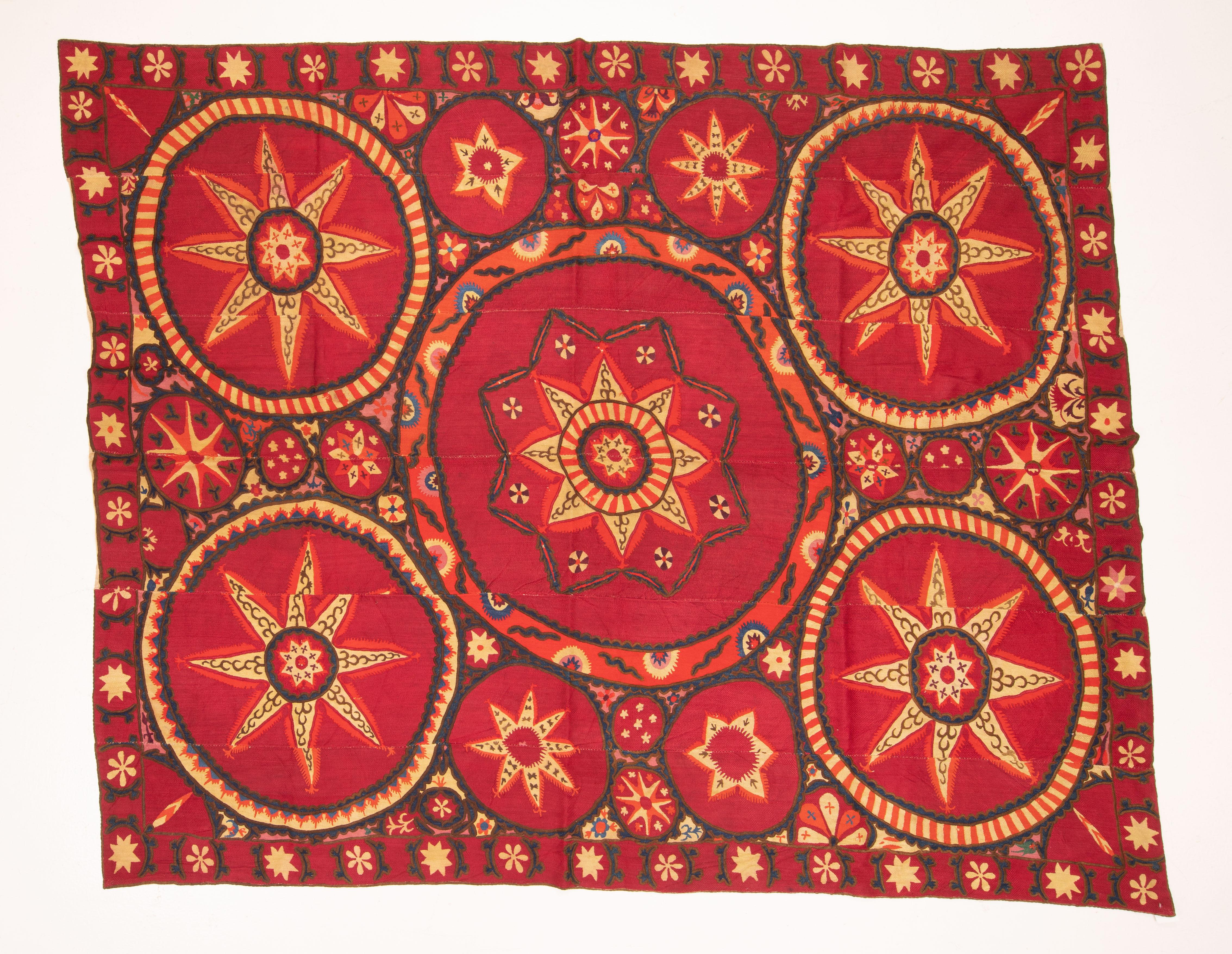 uzanis from the regions of Tashkent and Pishkent have some astral names such az ‘moon sky’,
‘star sky ‘. The main characteristic of these suzanis is that of their being fully embroidered in silk and sometimes in wool in sections.
Ground cloth is