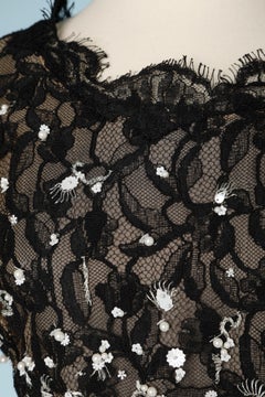 Fully embroidered cocktail dress on a black lace base Oscar de la Renta