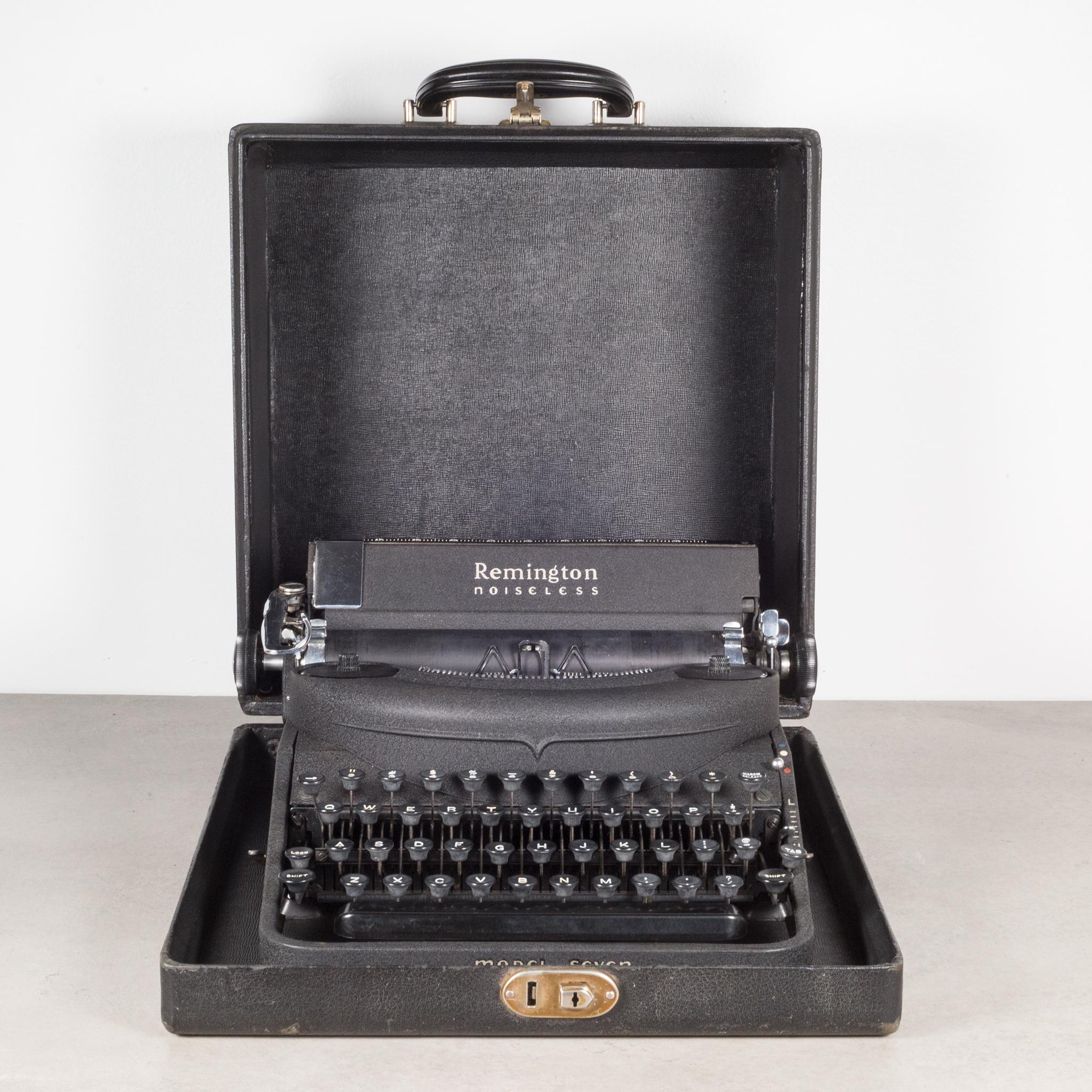 About

An original Remington Rand Portable Noiseless Model Seven Typewriter with black crinkle finish and original case. This typewriter is very clean and has been fully refurbished. It has smooth typing and the carriage advances and functions