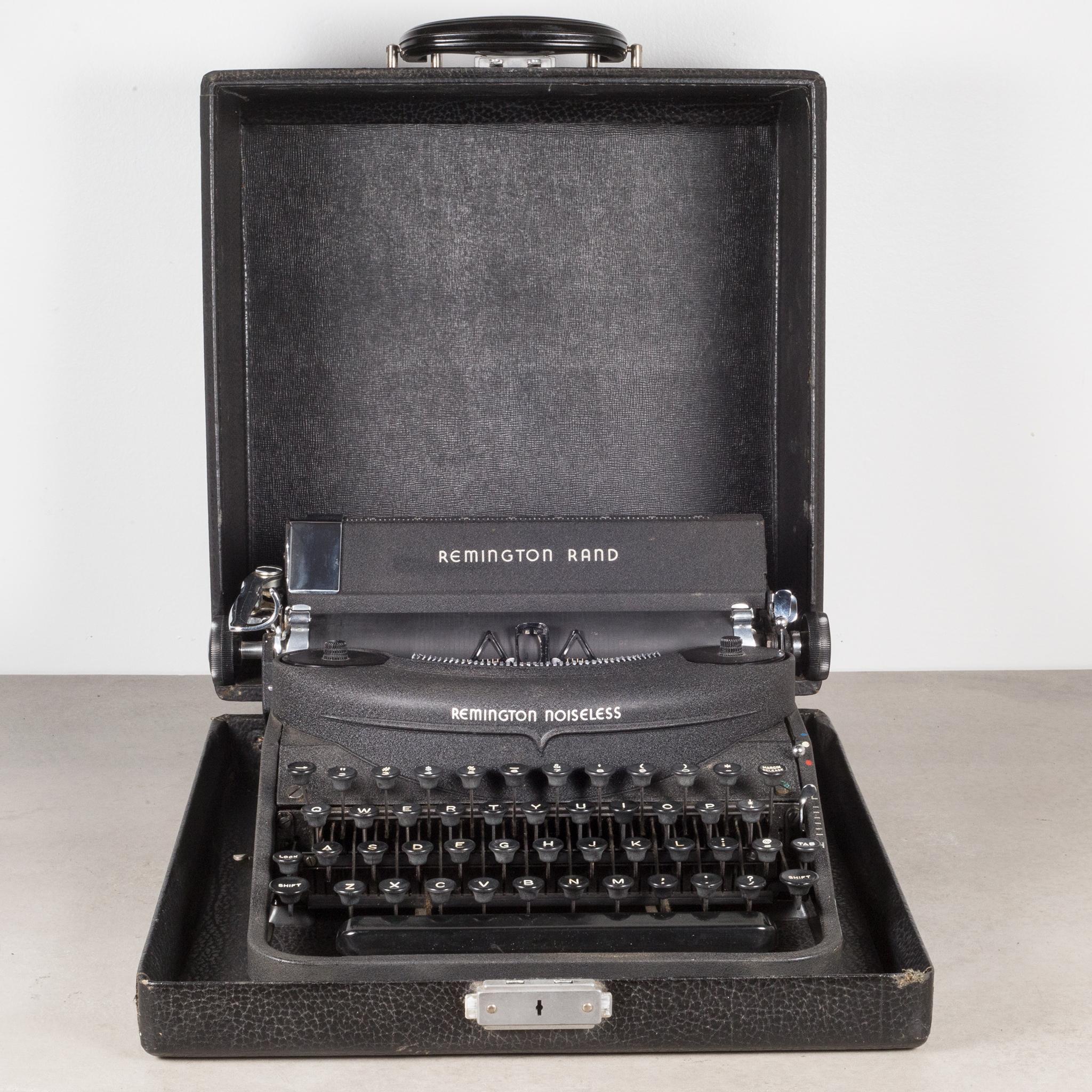 About

An original Remington Rand Portable Noiseless Typewriter with black crinkle finish and original case. This typewriter is very clean and has been fully refurbished. It has smooth typing and the carriage advances and functions very well. The
