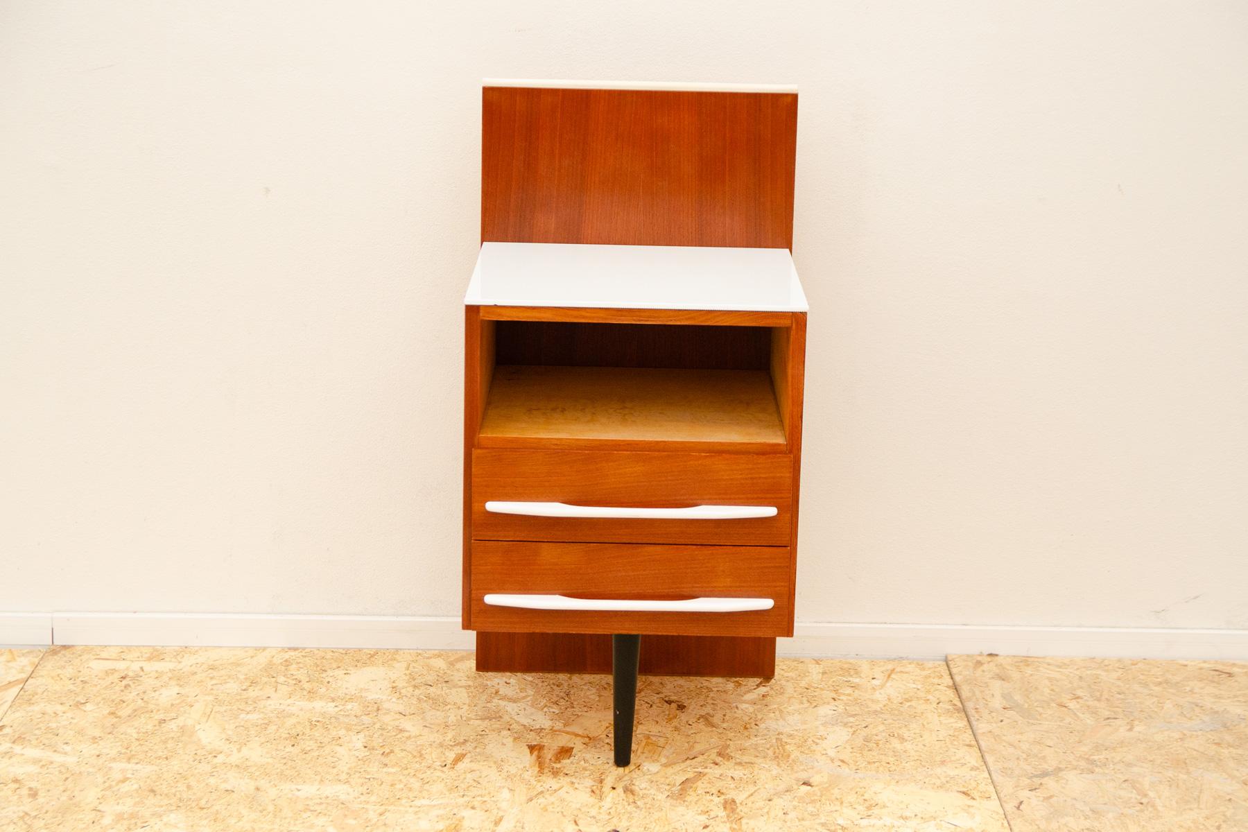 This nightstand/bedside table was designed by Mojmír Požár for UP Závody and made in the former Czechoslovakia in the 1960´s. Mahogany and beech wood.
In excellent condition, fully renovated.

Height: 81 cm

width: 41 cm

depth: 43 cm