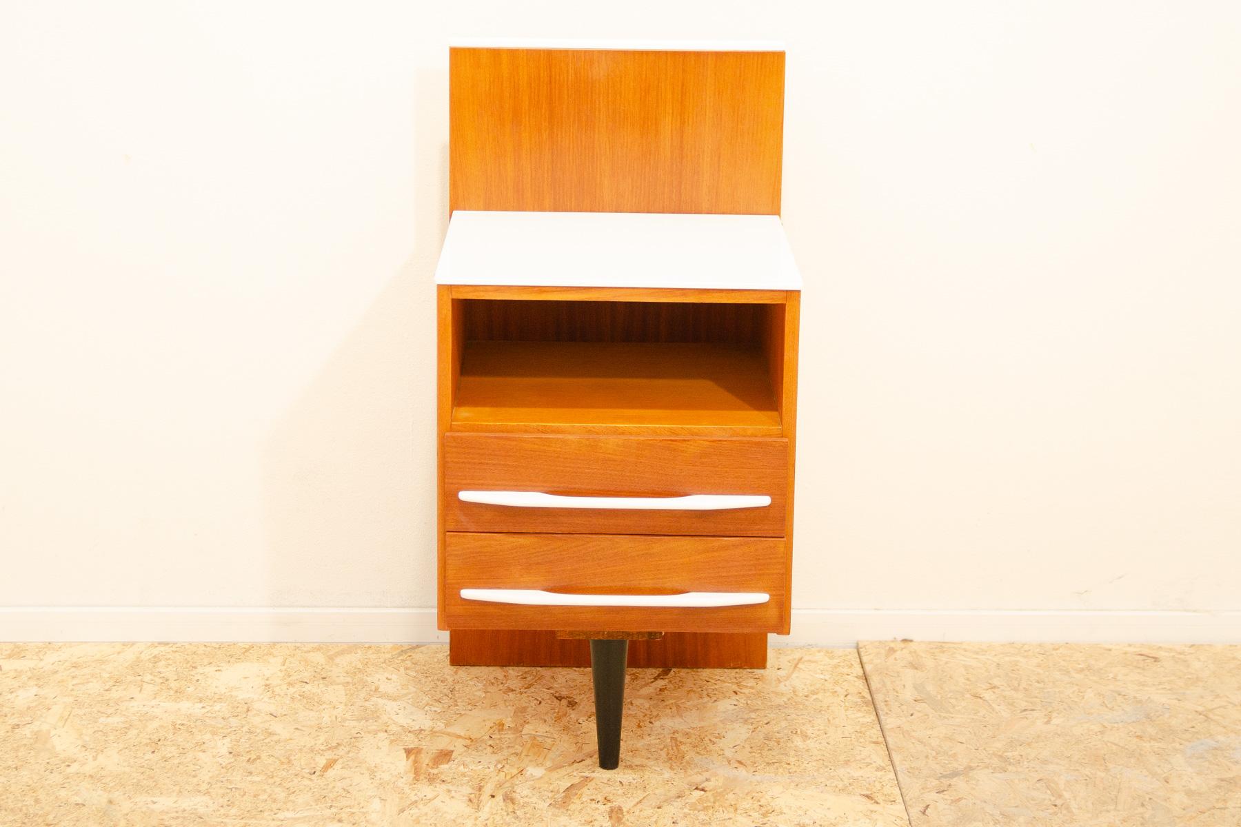 This nightstand/bedside table was designed by Mojmír Požár for UP Závody and made in the former Czechoslovakia in the 1960´s. It´s made af ash and beech wood, white glass on the top.
In excellent condition, fully renovated.

Height: 81 cm

width: 41