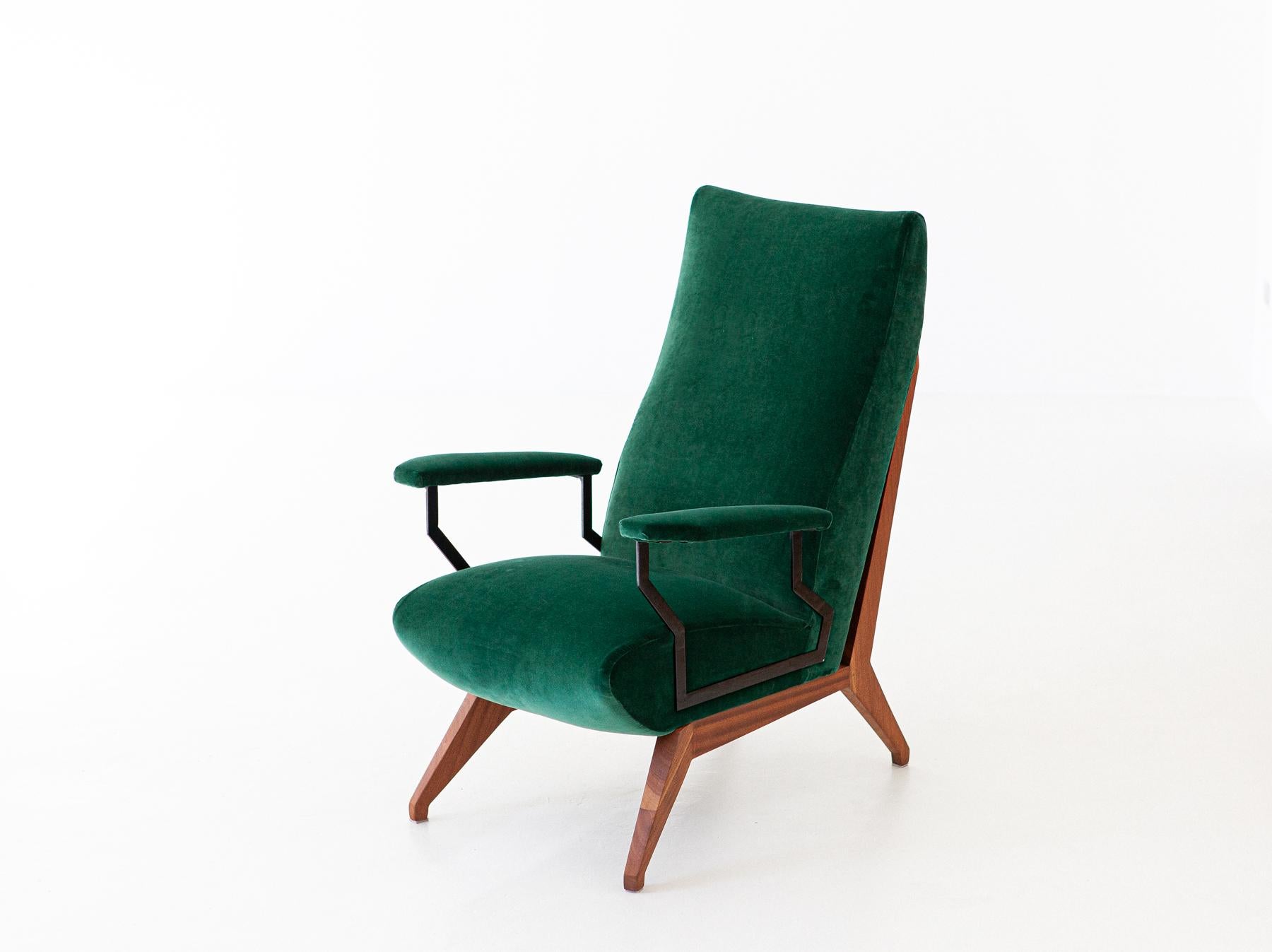 Mid-Century Modern Lounge chair with armrests manufactured in Italy in 1950s

Mahogany wood frame and new green cotton velvet upholstery , also the padding is new

Completely restored , new black enamel on the iron armrests , mahogany wooden frame