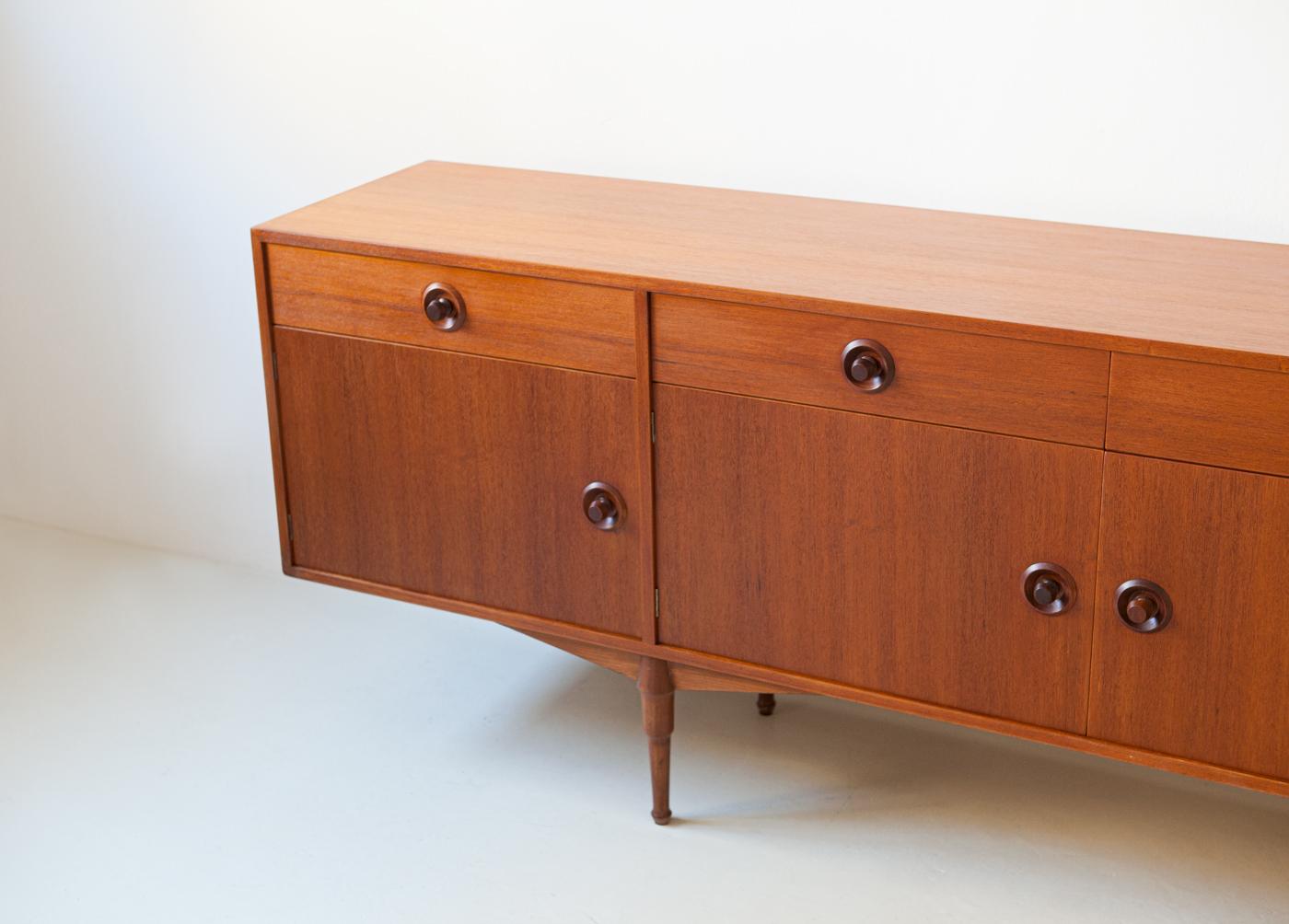 This credenza was manufactured in Italy during the 1960s
The cabinet has four compartment with four doors and four drawers

Fully restored:
The original finish has been completely removed to bring the wood back to its natural state
After we