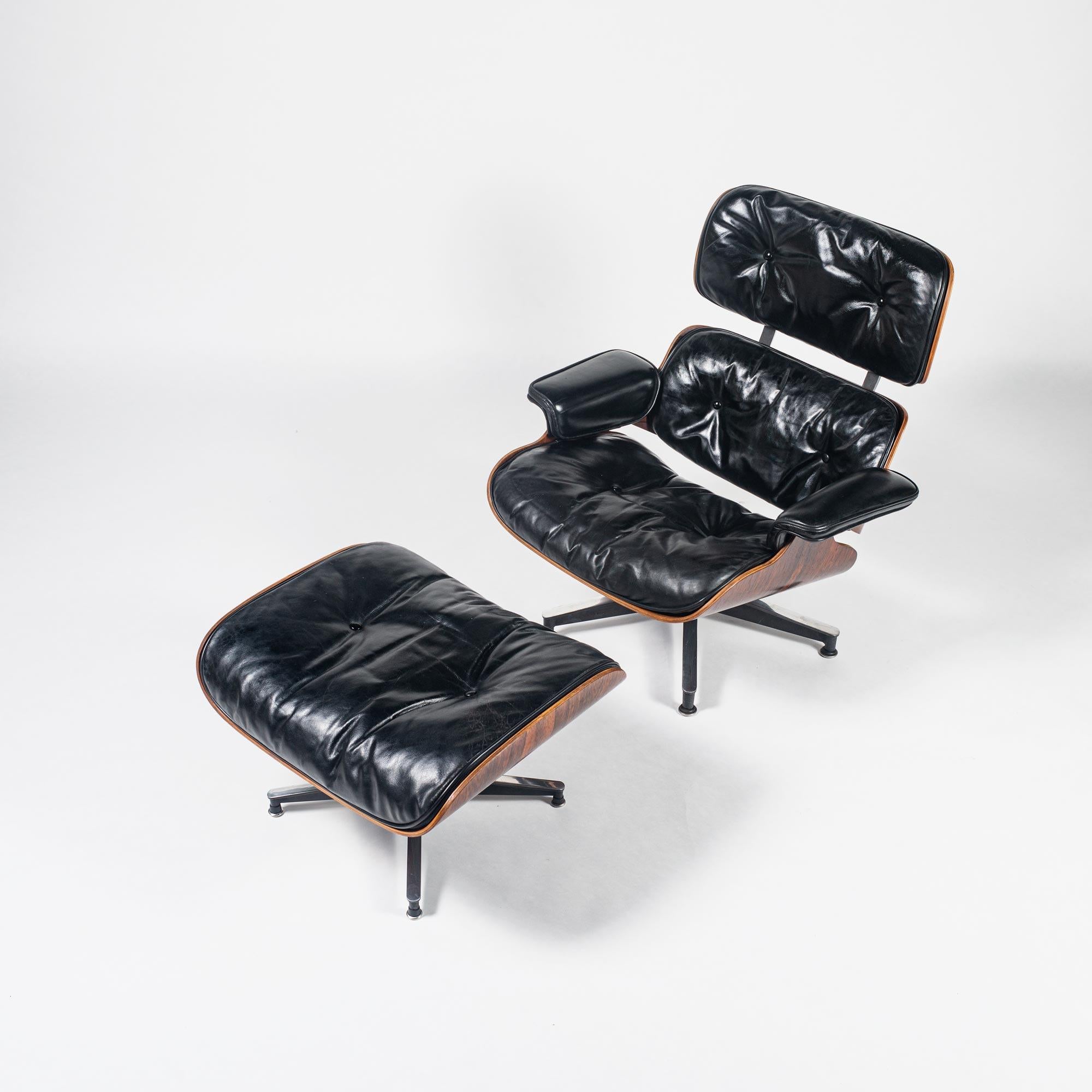 Rare collected 1956 Eames Lounge Chair with ottoman includes all the original details: -three screw armrests -down feather filled cushions -shell stamped number 82. New shock mounts, original leather with original down feather pillow re-fluffed. Two