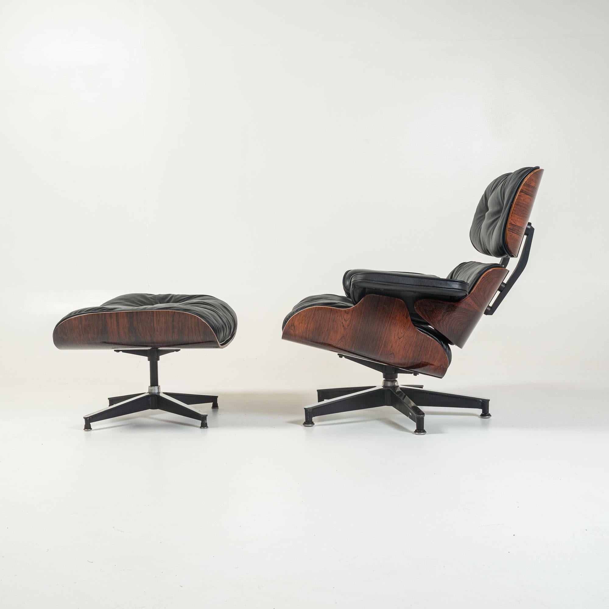 Rare and collectible 1959 Eames lounge chair with ottoman includes all the original details: three screw armrests down feather filled cushions shell stamped number 82. New shock mounts, new leather with original down feather pillow re-fluffed. Two