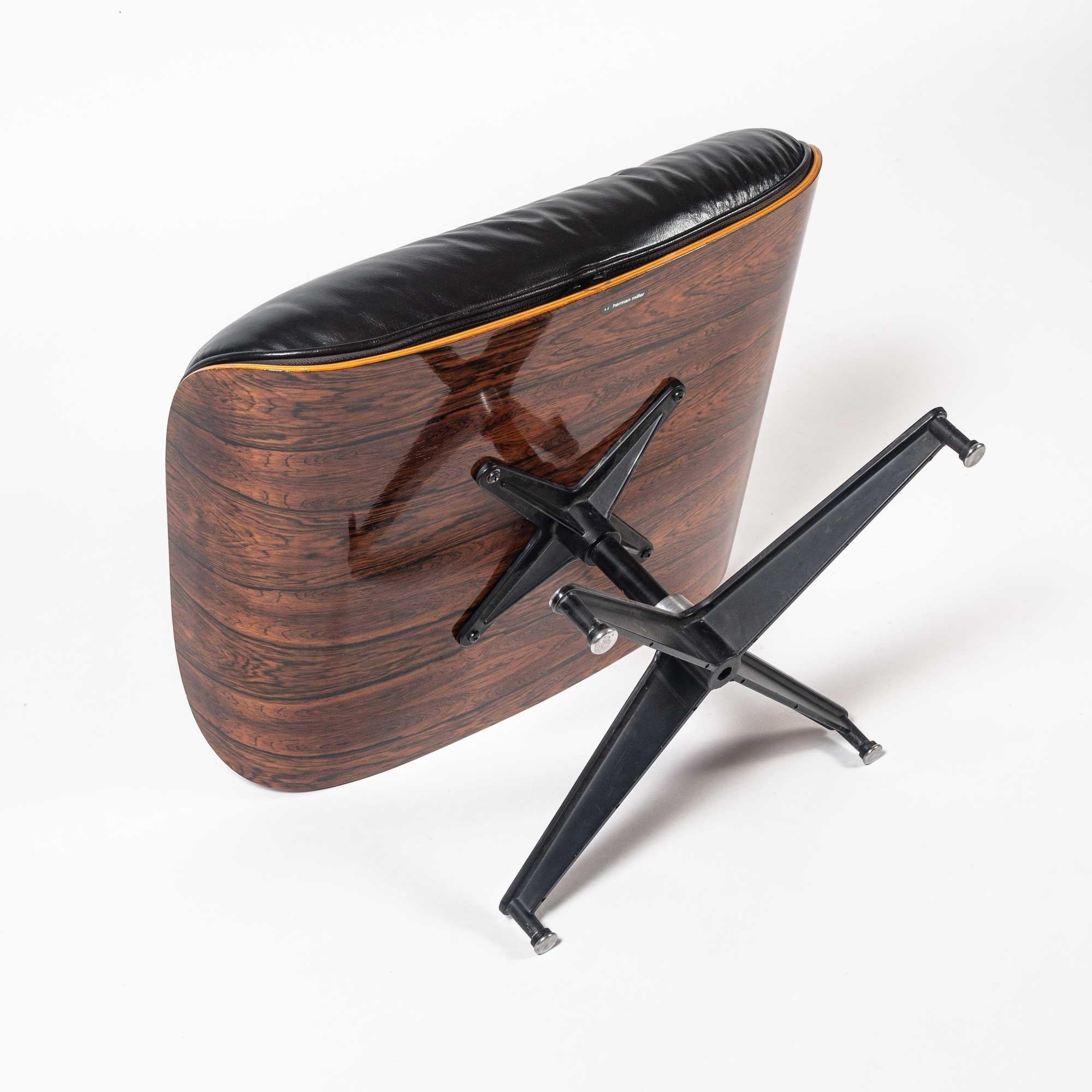Fully Restored 3rd Gen Eames Lounge Chair 670 and Ottoman 671 in Black Leather In Good Condition For Sale In Seattle, WA