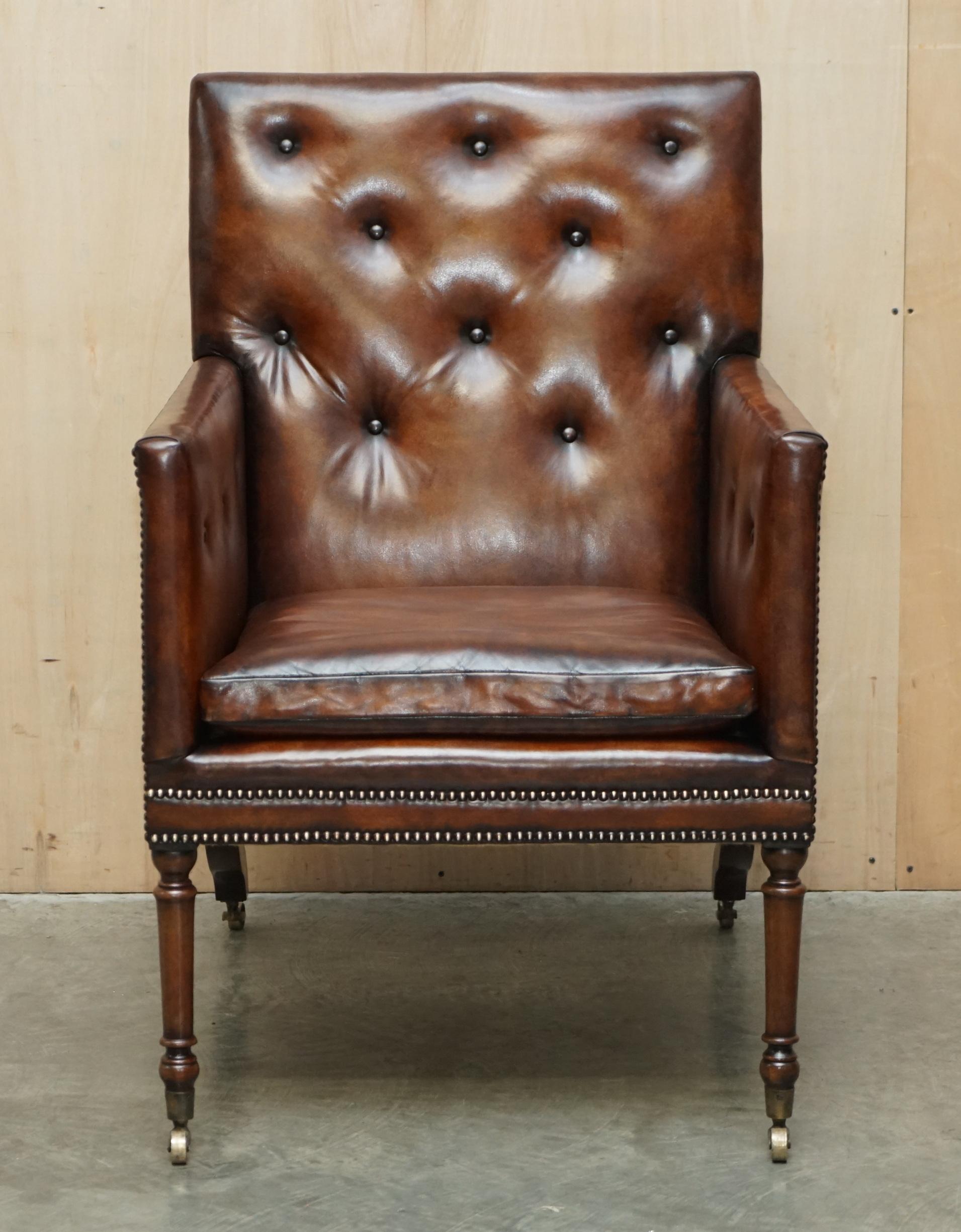We are delighted to offer for sale this exquisite original fully restored hand dyed brown leather Chesterfield library armchair from the George III era circa 1780

A fantastic looking and well made piece, the chair has been fully restored to