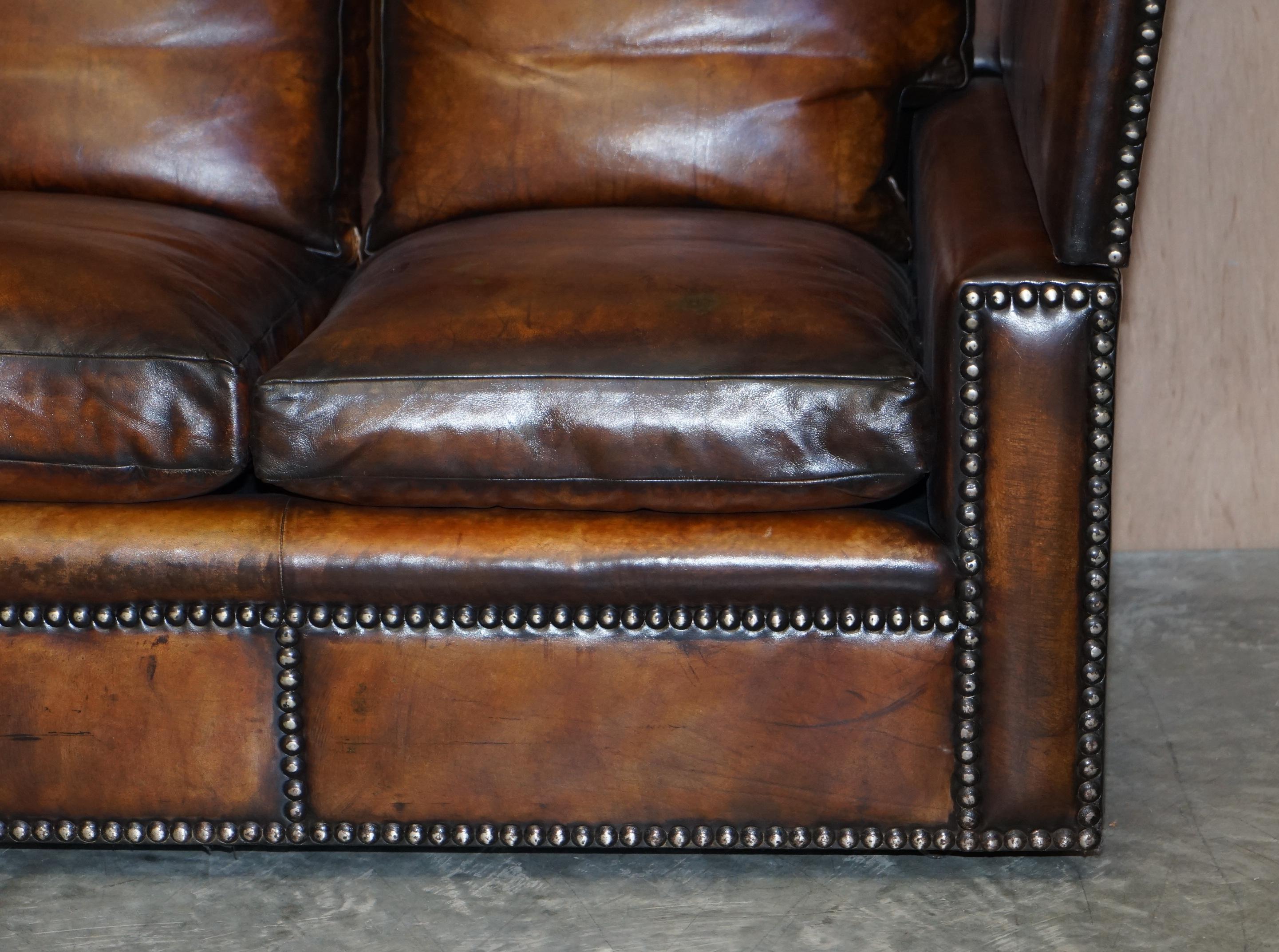 Victorian Fully Restored Antique Hand Dyed Brown Leather Four Seater Knoll Drop Arm Sofa For Sale