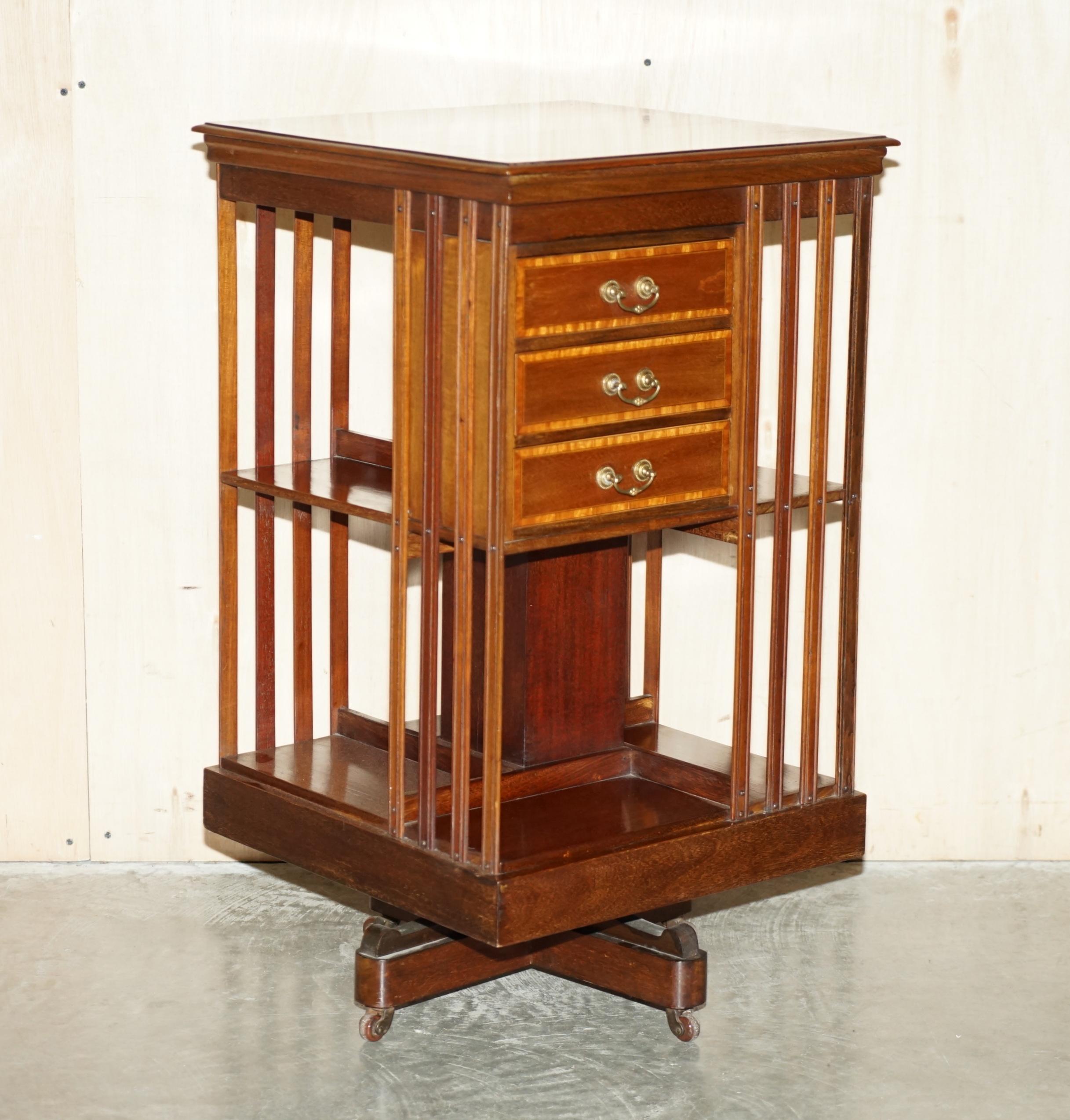 We are delighted to offer for sale this exhibition quality, fully restored, English Walnut with Satinwood inlay, circa 1880 revolving bookcase table with exquisitely finished top and very rare small drawer section 

A good looking and well made