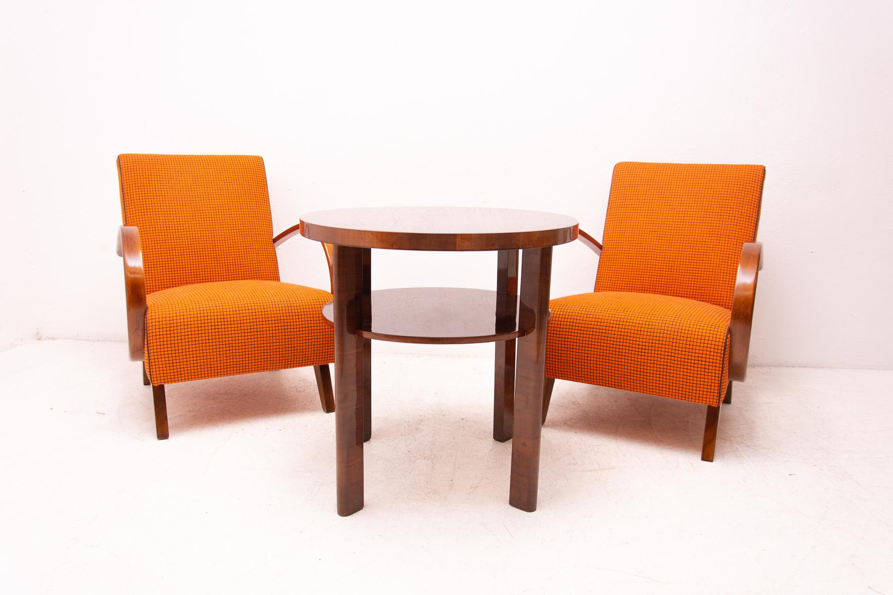 This pair of bentwood armchairs “C” was designed by Jindrich Halabala and were produced by UP Závody in the 1950´s. The chairs are stable and comfortable and in excellent condition thanks to a complete renovation. New upholstery, the wood was