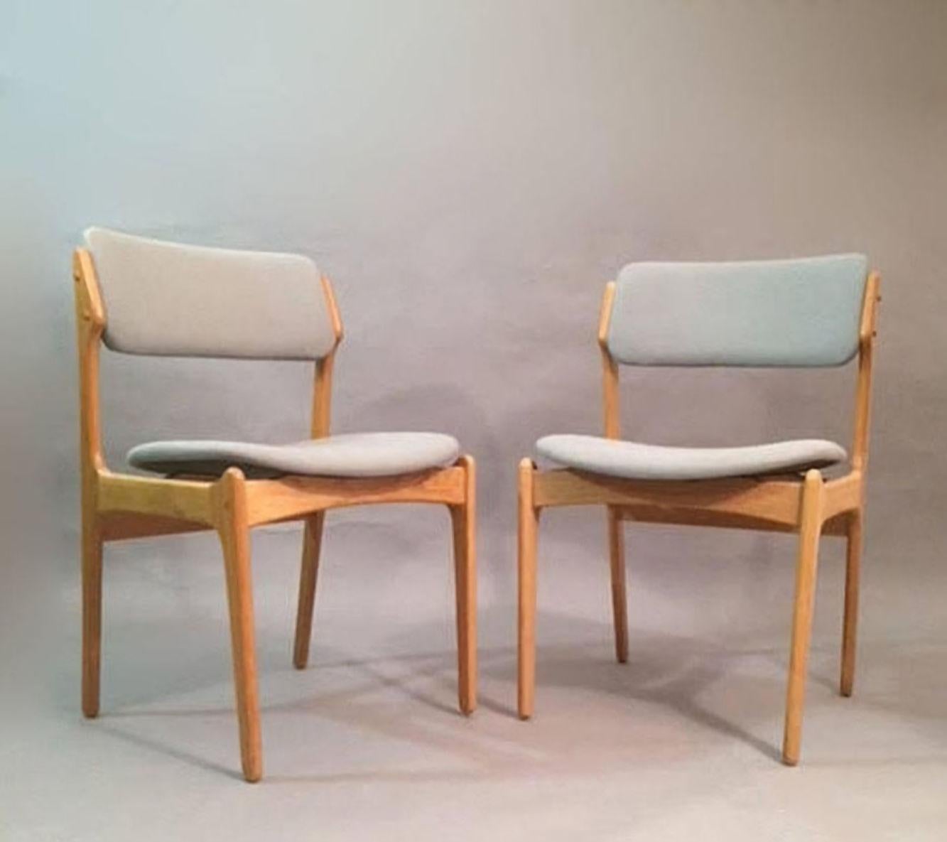 Fully restored Danish dining chairs inc. reupholstery designed by Erik Buch in 1949.

The chairs have a simple solid construction with elegant lines and a comfortable seating experience on the floating seat design that is becoming increasingly